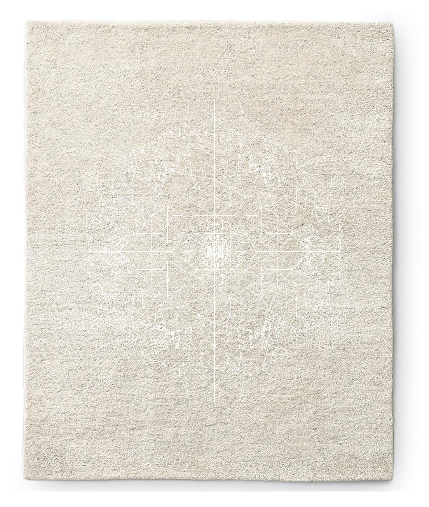 Inspired by principles of sacred geometry, this mind altering handmade spun wool rug is a sophisticated piece for any home. The intricate interlocking geometries evoke a deep sense of timeless elegance. The bold geometric graphic instantly adds