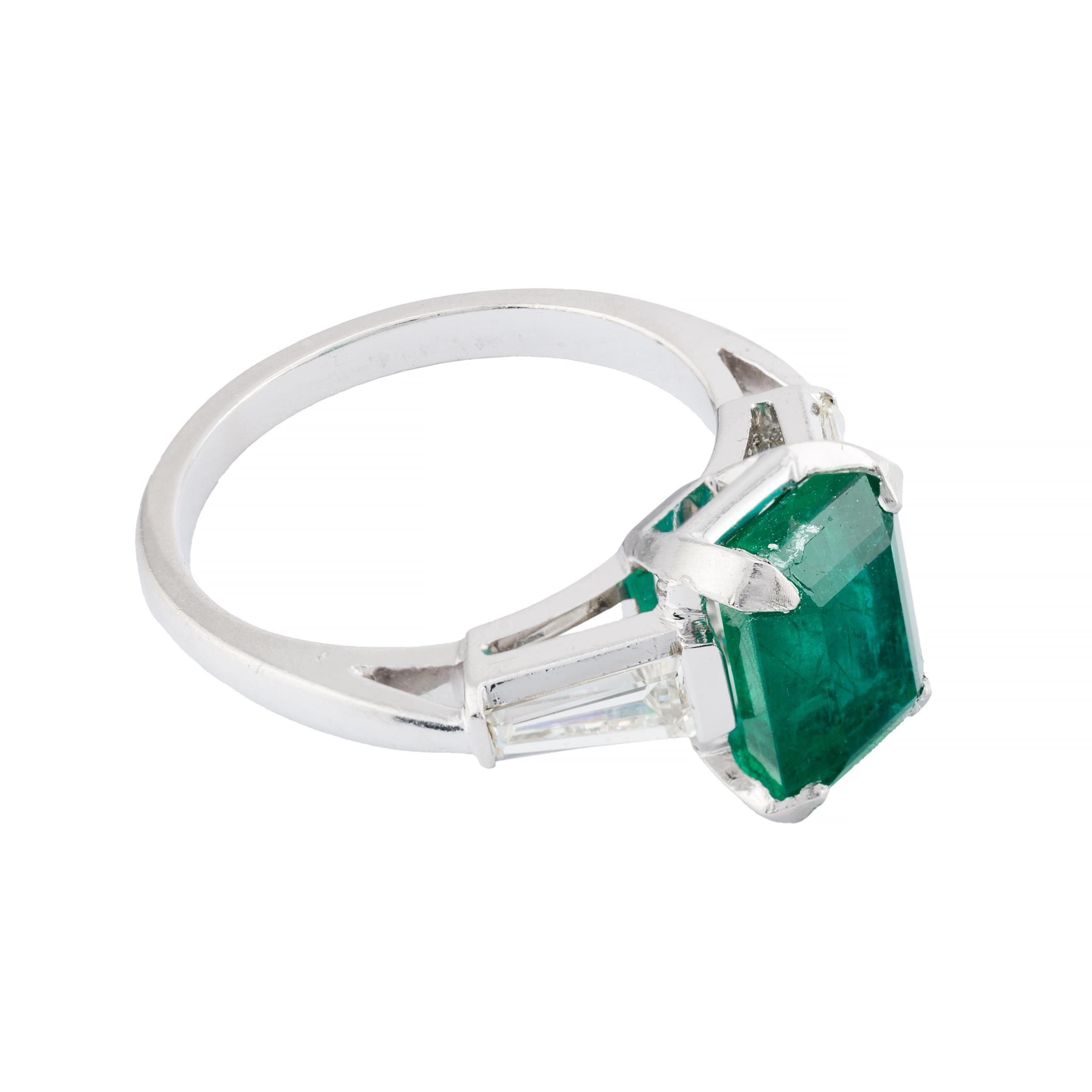 Emerald Cut Verdant 2.92ct Emerald & Baguette Cut Diamond Three Stone Ring in Platinum For Sale