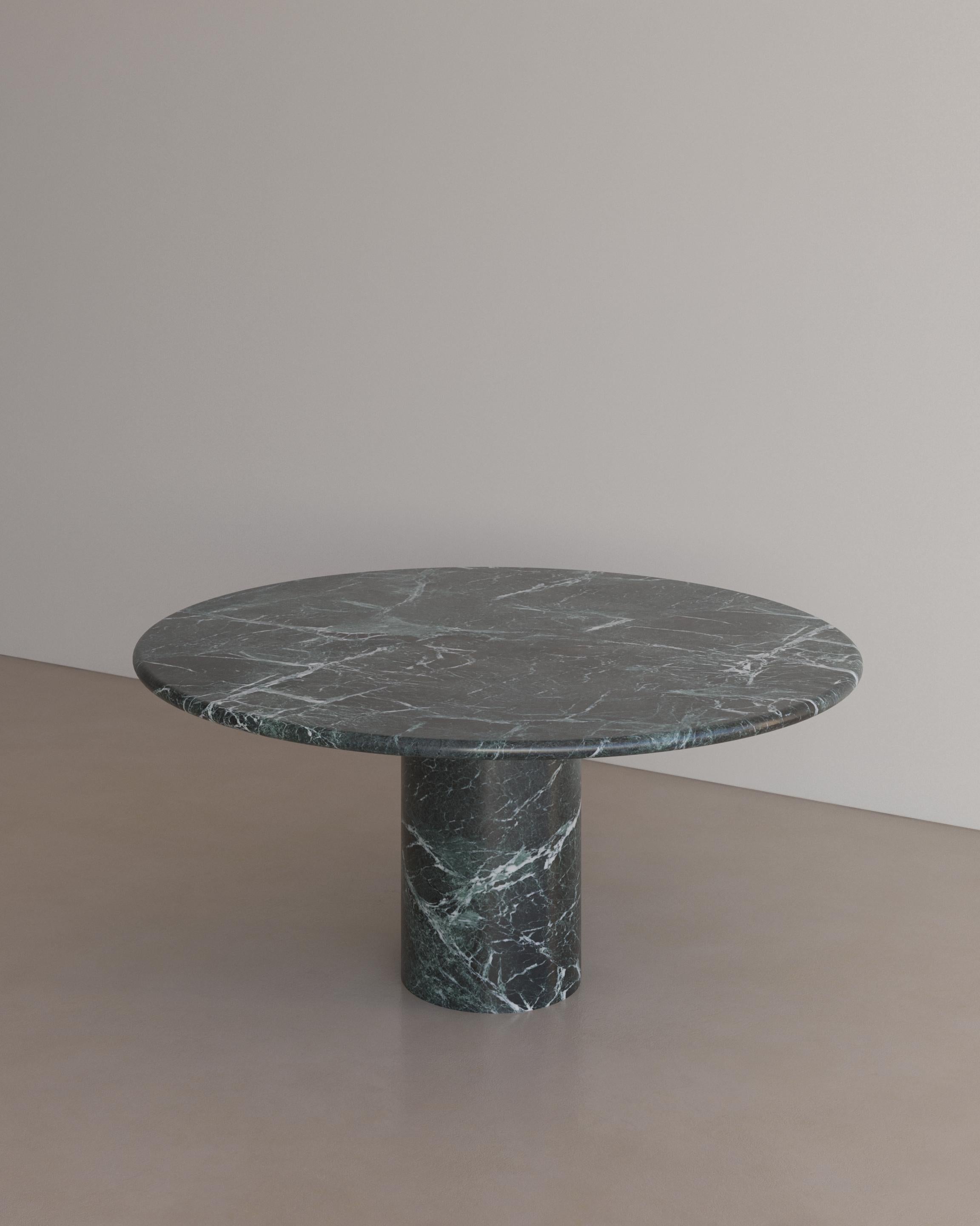 The Voyage Dining Table I in Verde Alpi Marble by The Essentialist celebrates the simple pleasures that define life and replenish the soul through harnessing essential form. Envisioned as an ode to historical elegance, captured through a modern lens