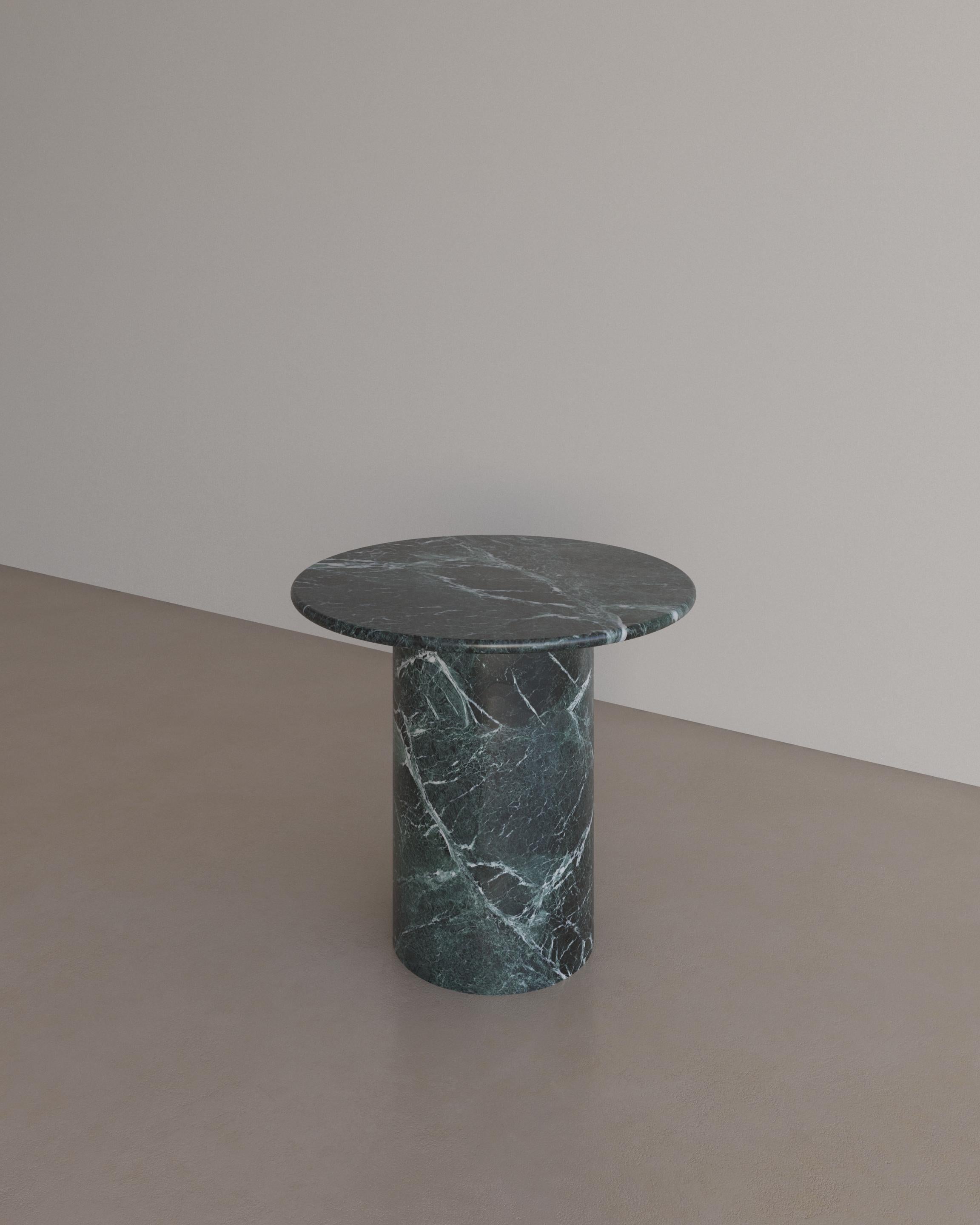 The Essentialist presents the Voyage Occasional Table I in Verde Alpi. 
The Voyage Occasional Table I celebrates the simple pleasures that define life and replenish the soul through harnessing essential form. Envisioned as an ode to historical