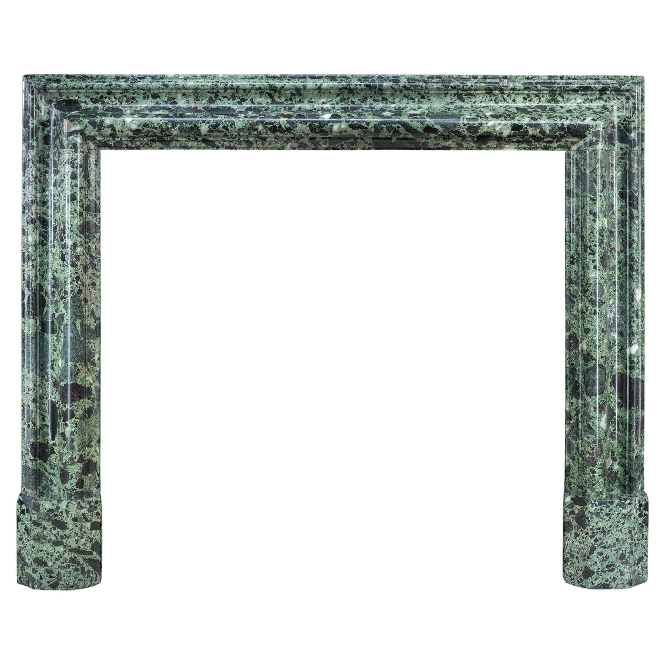 Verde Antico Marble Bolection Fireplace For Sale