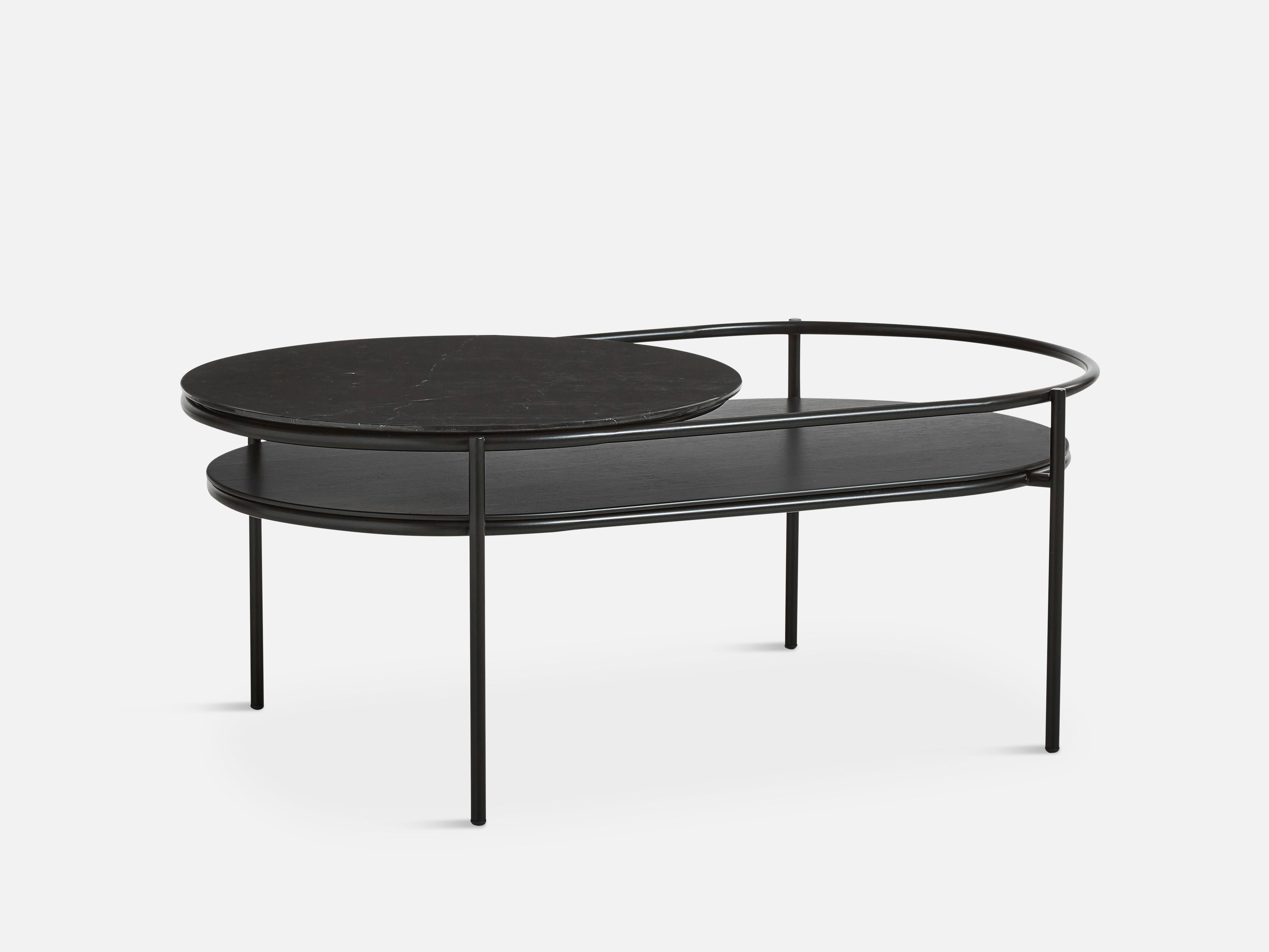 Verde coffee black table by Rikke Frost
Materials: metal, oak, Nero Marquina marble.
Dimensions: D 60 x W 106 x H 41 cm

The founders, Mia and Torben Koed, decided to put their 30 years of experience into a new project. It was time for a change
