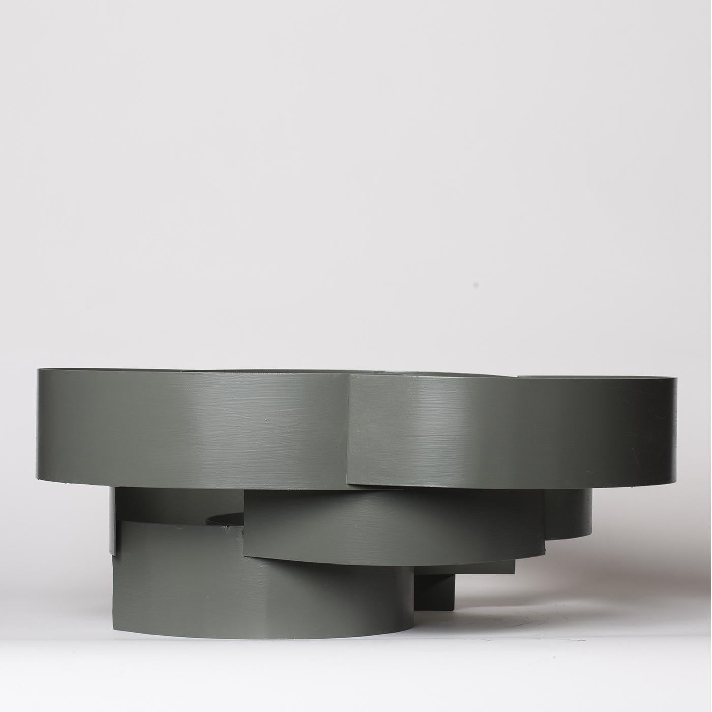 This handmade metal sculptural centerpiece has been polished into a gray-green color. Each piece by Sciortino is a one of a kind piece, entailing that slight variations in size, shape, and color are possible and are part of the artistic value of