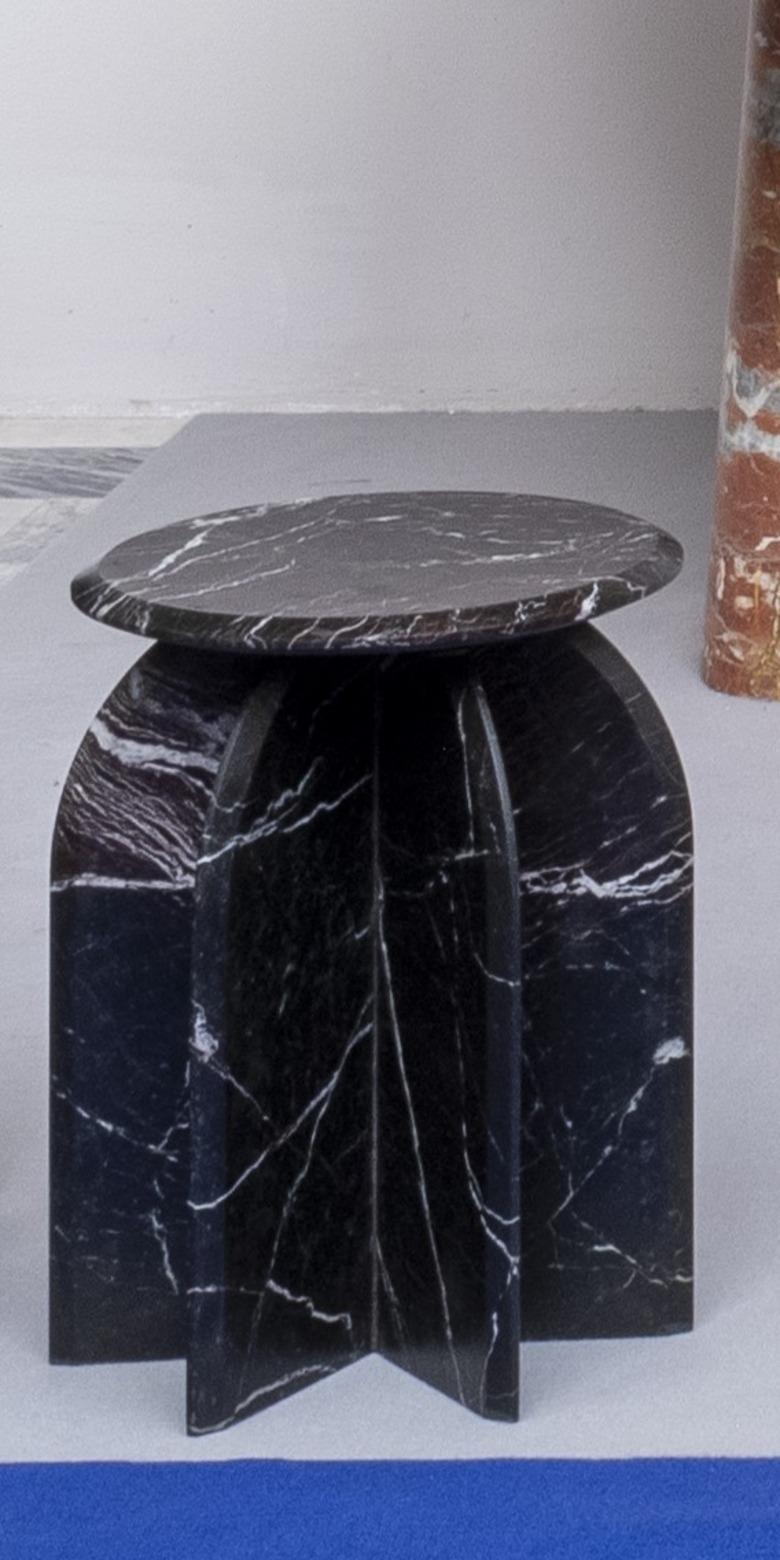 Palladio Side Table is much more than a simple piece of furniture; it's a tribute to the grandeur of Palladian neoclassical architecture. Crafted with artisanal care and premium materials, this table features five converging arches and a round top,
