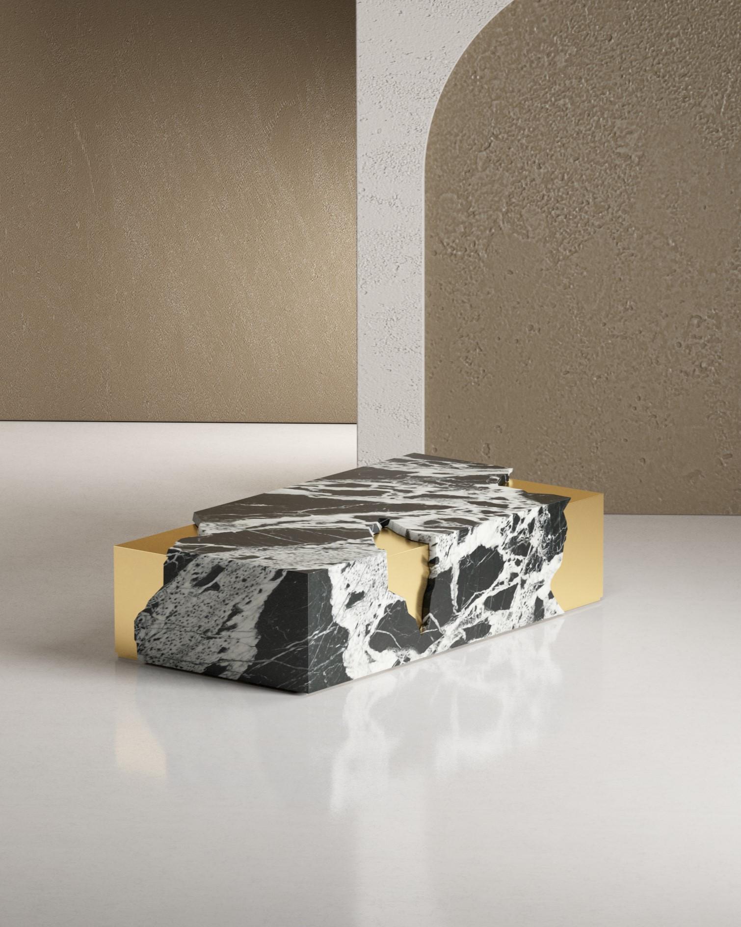 Trasforma il tuo spazio abitativo in un capolavoro scultoreo con lo straordinario tavolino da caffè Arthur Marble, dove l'artigianato monumentale del marmo incontra l'innovazione del design contemporaneo in un'armonia mozzafiato.

Il nostro Arthur