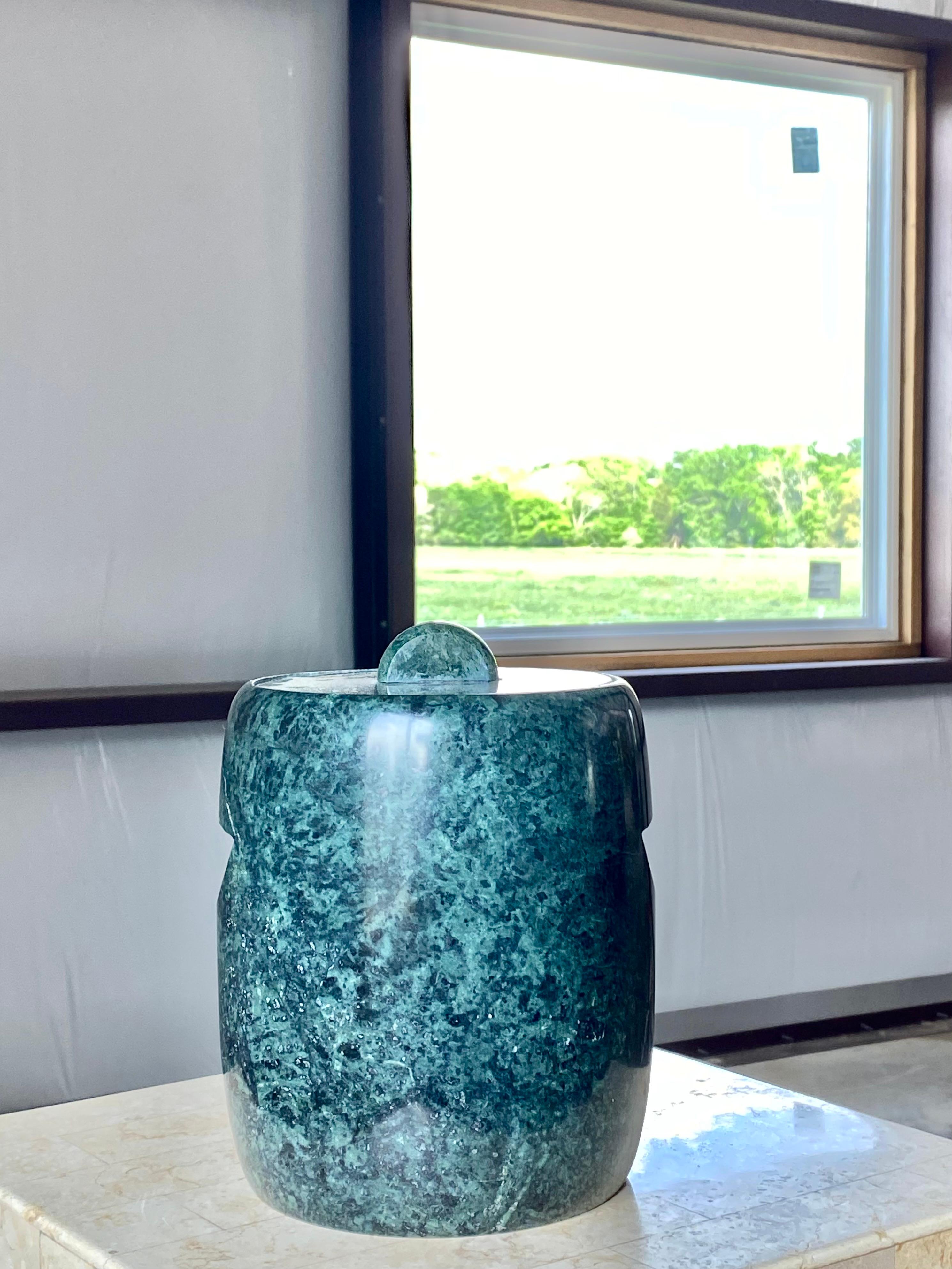 Unique 1970s Green Marble Modernist ice bucket with lid. Sculptural and made of richly speckled green marble with ivory veining. You won't have to fuss with loosening handles or screws. This marble ice bucket features inset handles cut into the