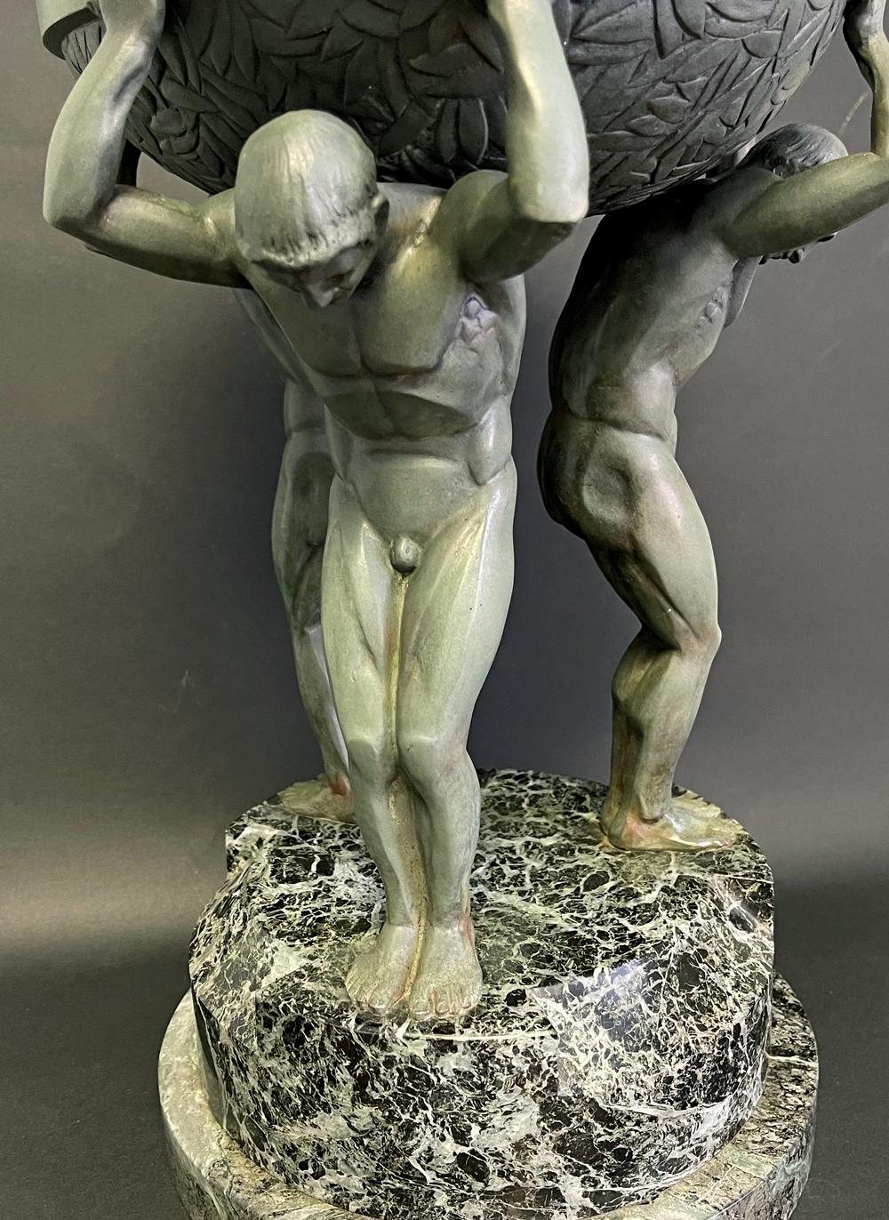 French Verdigris Bronze Art Deco Centerpiece Supported by Three Nude Male Figures For Sale