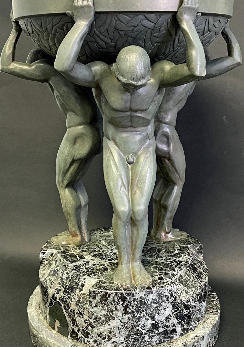 Cast Verdigris Bronze Art Deco Centerpiece Supported by Three Nude Male Figures For Sale