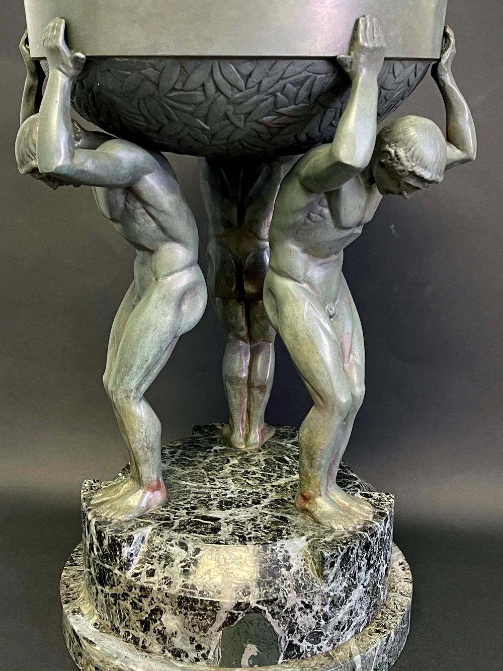 Mid-20th Century Verdigris Bronze Art Deco Centerpiece Supported by Three Nude Male Figures For Sale