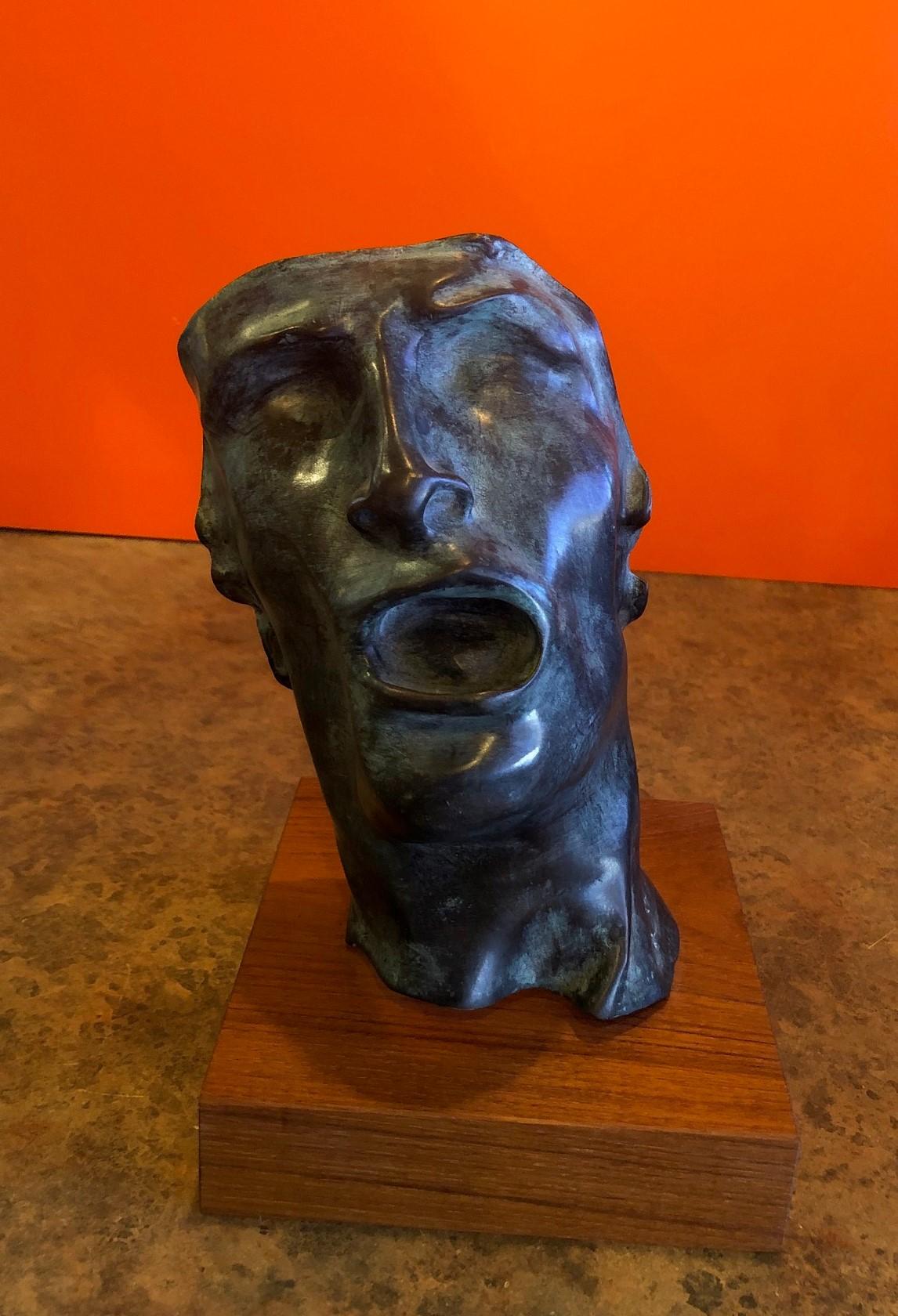 bronze face sculpture