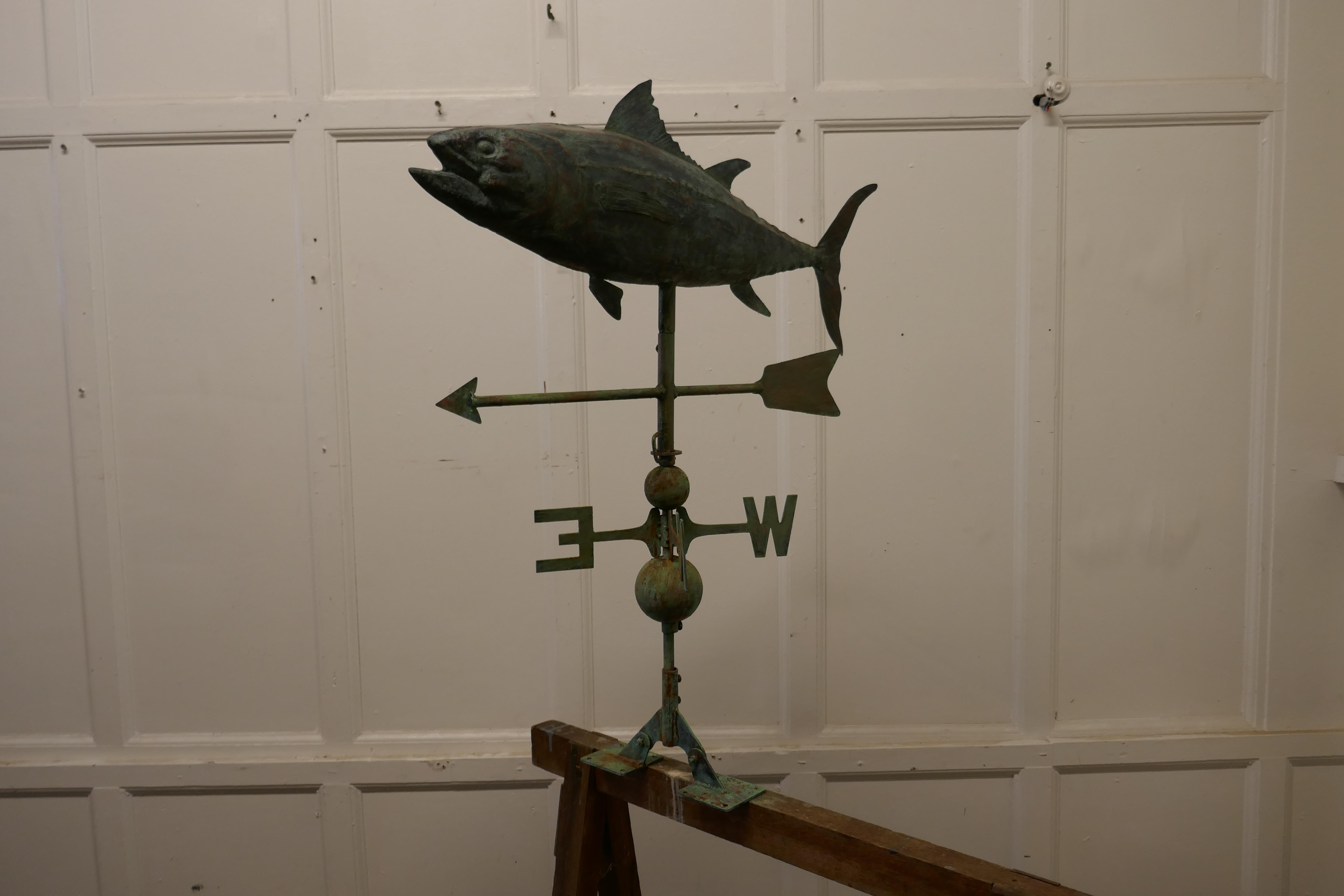 Verdigris copper folk art fish weather vane

The model Fish at the top of this Weathervane is hand made and finely detailed in its construction, it is mounted on a rod which has a fixing plate at the bottom
The vane is in good working condition