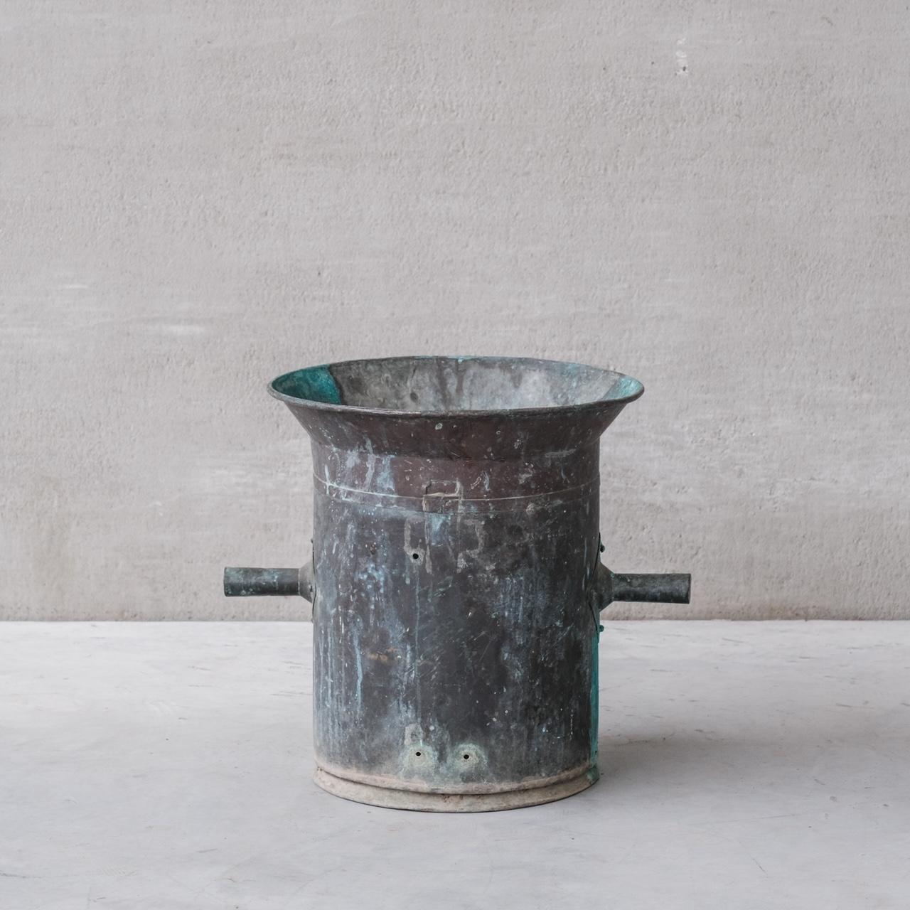An increasingly rare copper planter with original and natural verdigris. 

France, c1950s. 

Unusual model with two handles. 

Ideal as a planter for indoors or external use. 

Some wear commensurate with age, but generally good condition.