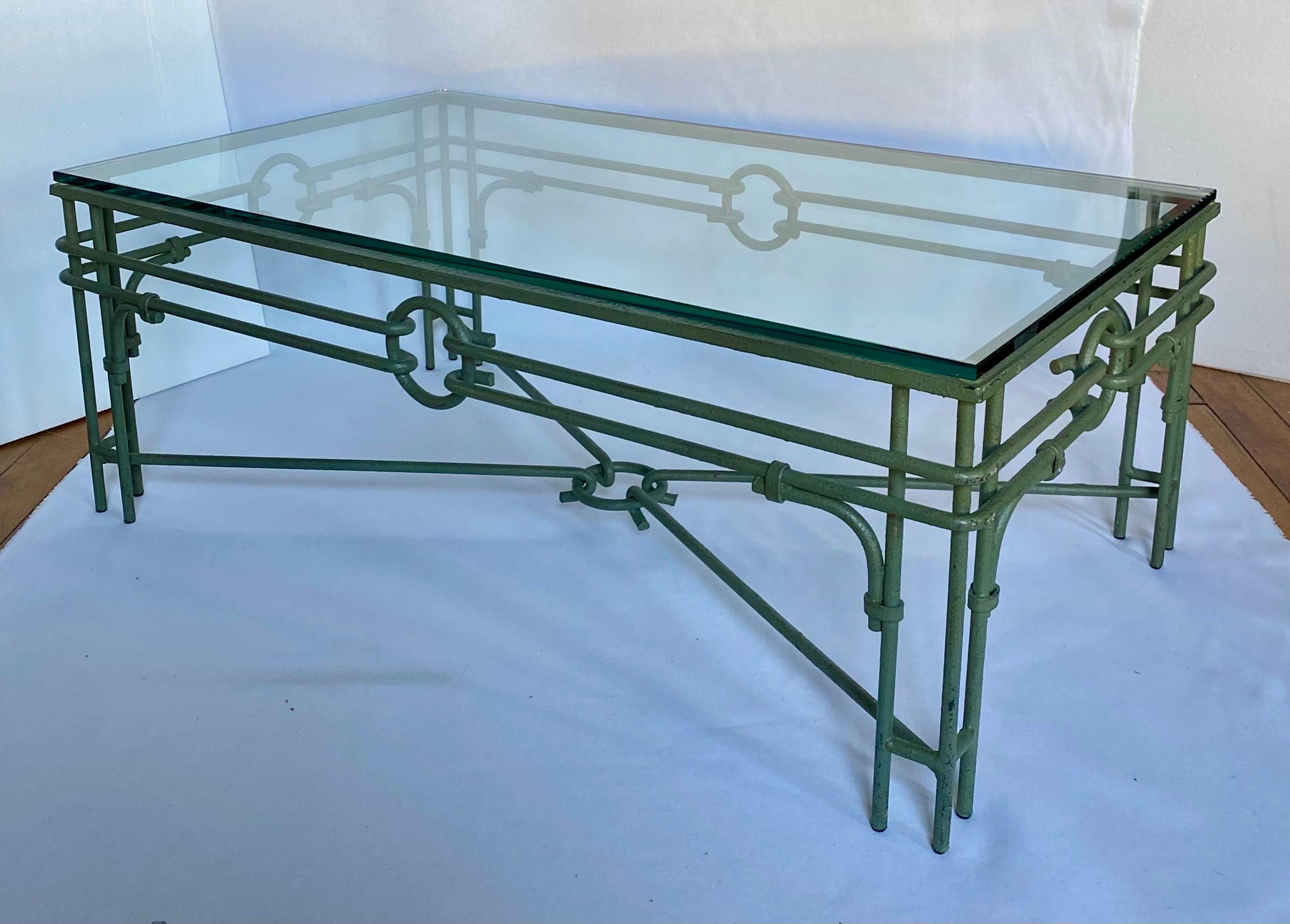 Large metal and glass rectangular coffee or cocktail table featuring a textured verdigris finish and sculptural stretcher and ring equestrian buckle-like details. New 1/2-inch thick glass top.

In the style of Giacometti.  