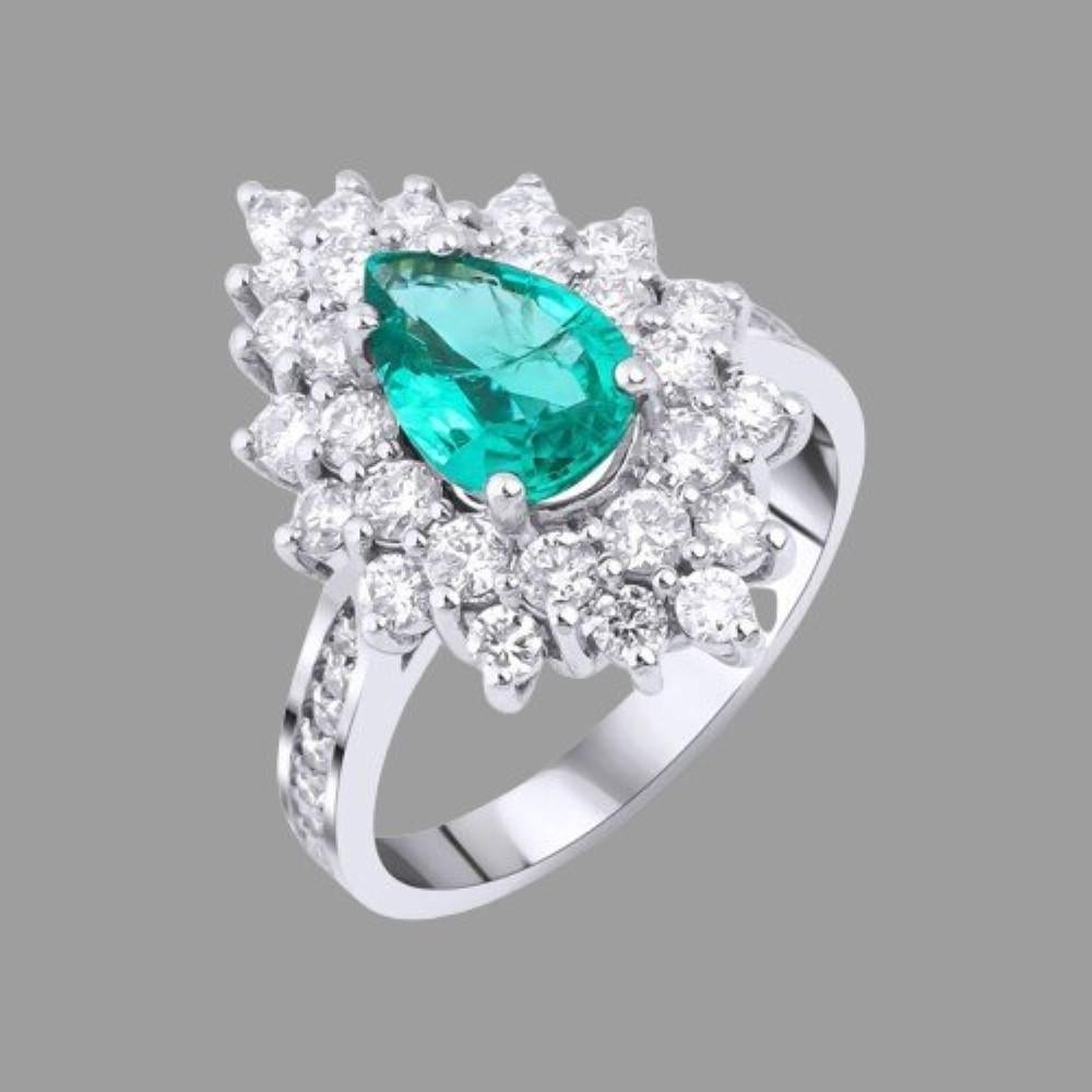 Modern 2.54ct Pear Cut Emerald And Diamond Ring For Sale