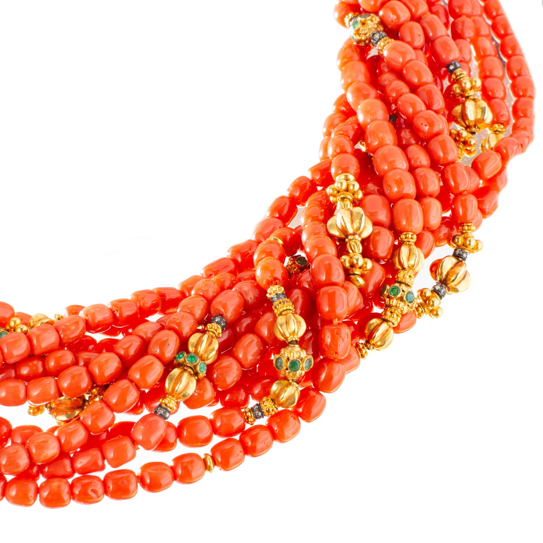 Verdura 18k yellow gold multi-strand coral bead necklace with faceted 18k yellow gold beads, secured by an 18k yellow gold twisted rope hook clasp marked 