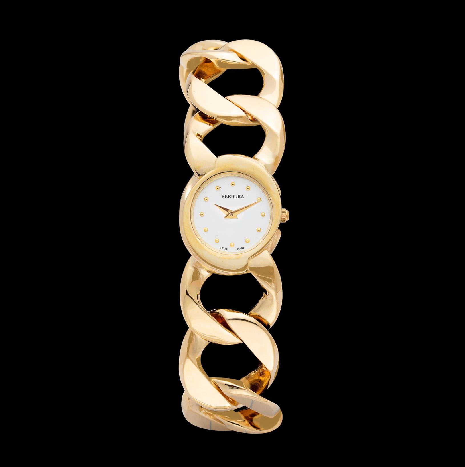 Own this iconic piece of jewelry by Verdura! Made famous by Greta Garbo in 1941, the 18k gold curb-link bracelet quartz watch has a white dial, dot numerals, sapphire crystal, and two hand movement.  With 13 links, it measures approximately 8