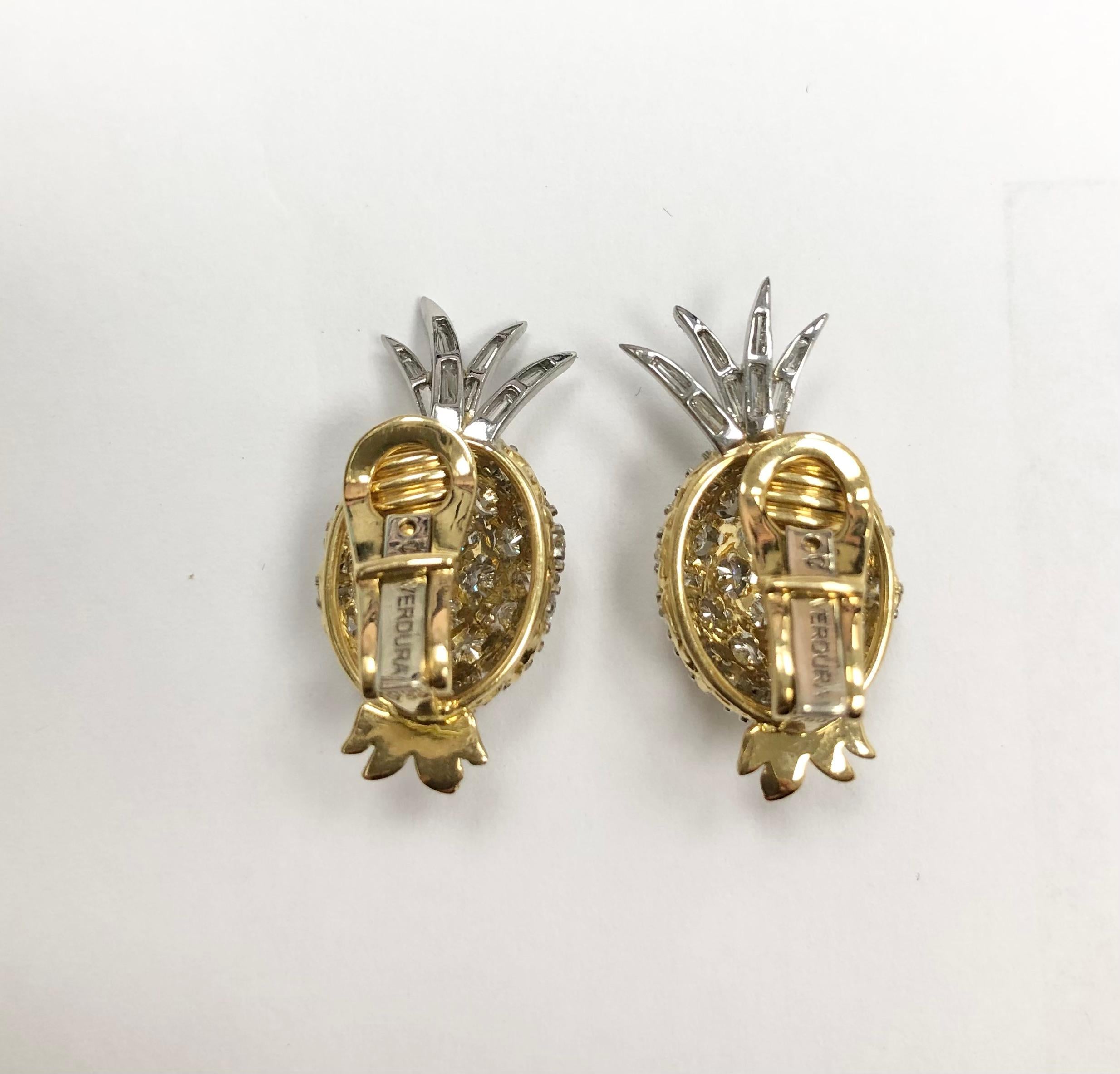 18K yellow gold and platinum diamond pineapple clip-on earrings. Set with 60 round diamonds approx 2.50 cts and 16 baguette diamonds approx 0.50ct, approx E color and VS clarity.
Measurment : appox 26.6 mm x 12.8 mm
Weight: 11.0 g
