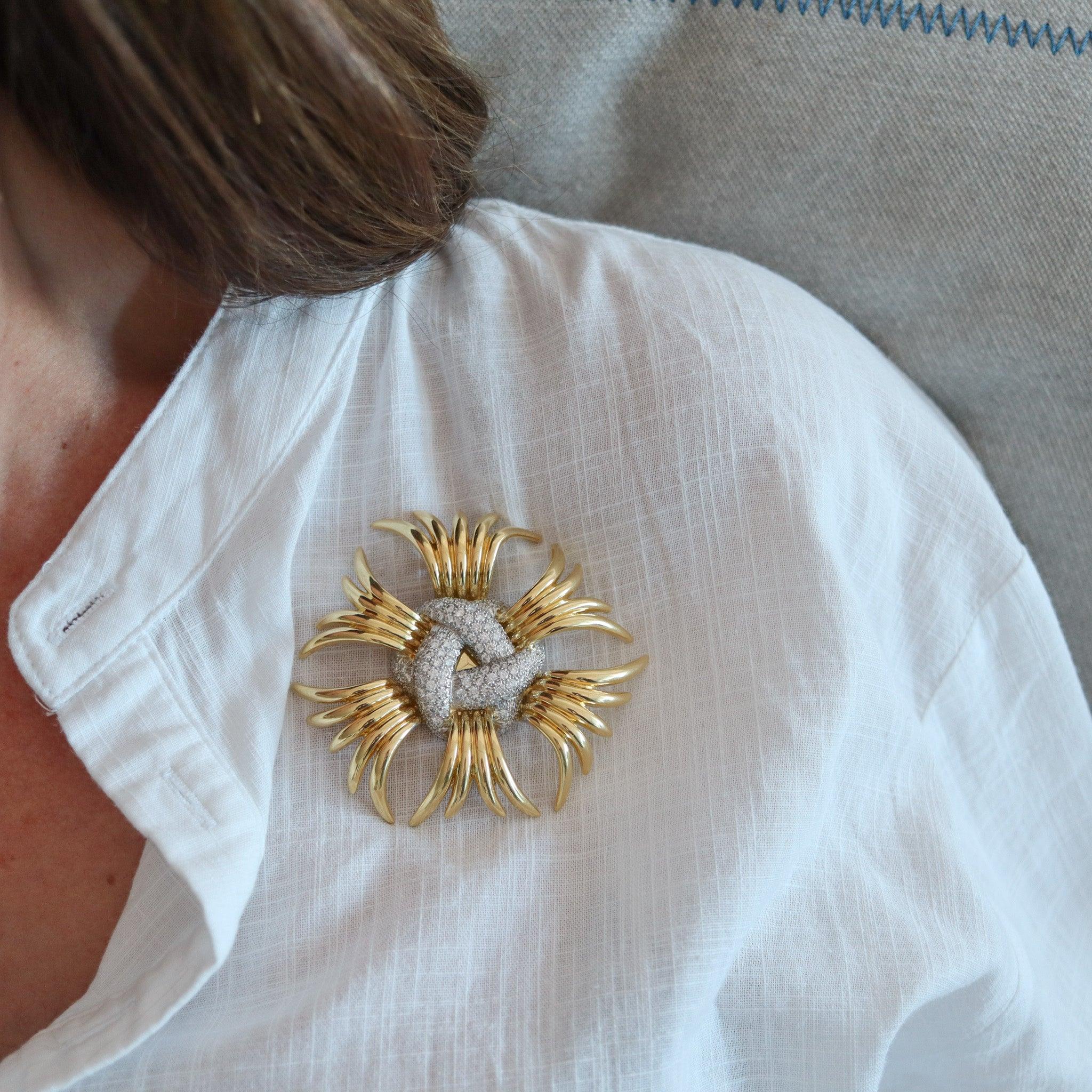 Pendant brooch designed by Verdura.

This is a very rare and bold versatile pendant-brooch created in Milan Italy by the renowned jewelry house of Verdura, back in 1970. The piece is pretty large and has been crafted in the shape of six curved-arms
