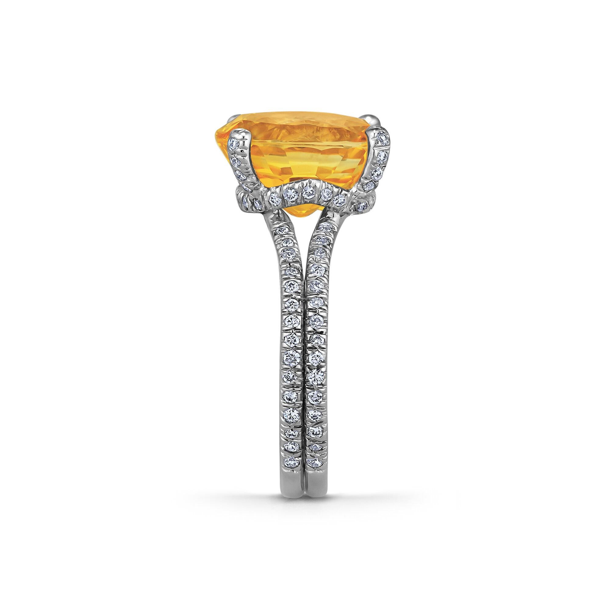 Let the sun shine in with this Verdura 5.70 carat luscious rich orangish yellow cushion cut sapphire diamond platinum ring.  Showcased in an elegant diamond platinum mounting, this exquisite gemstone will always light up your life.  Sapphire AGL