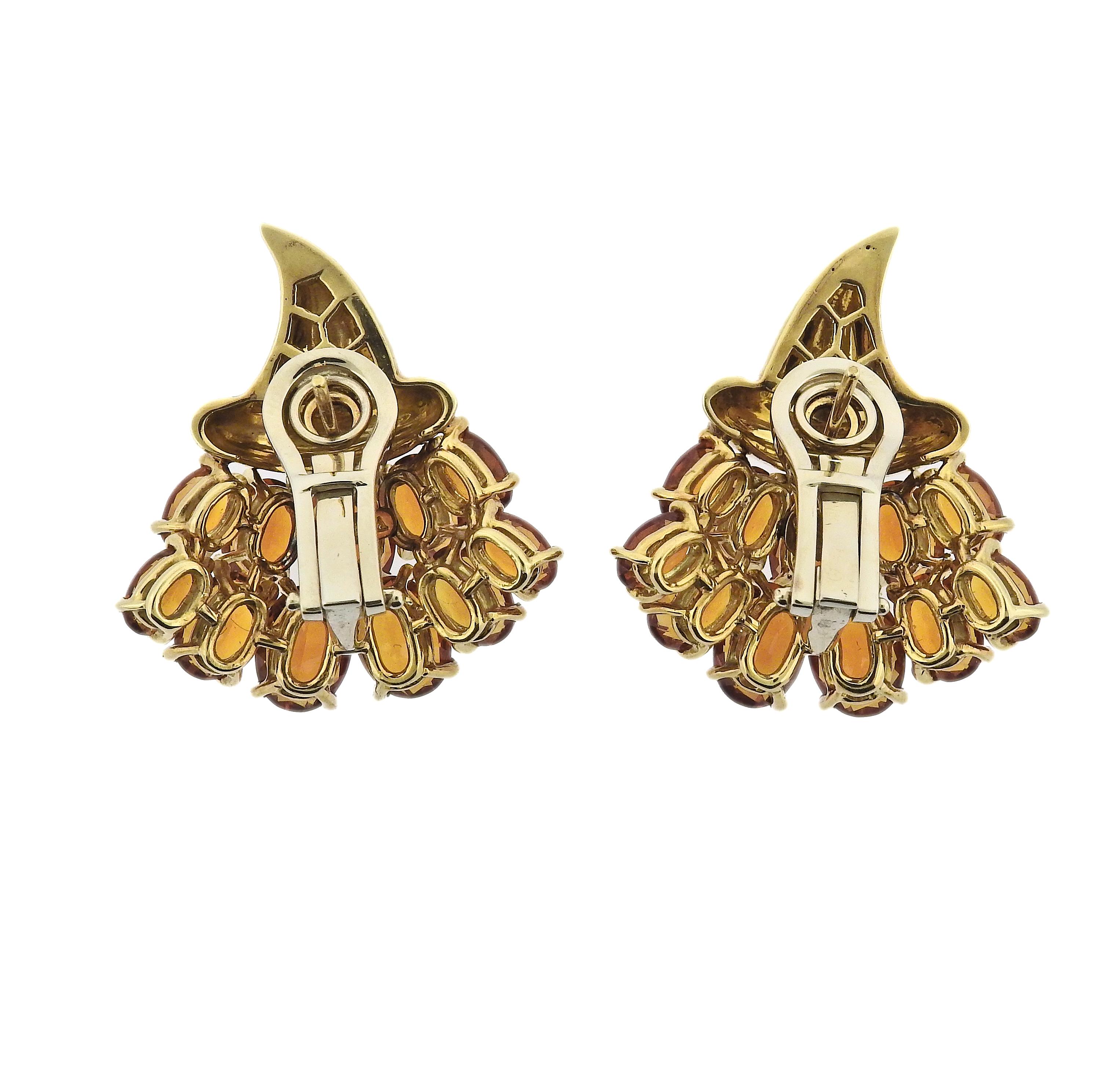 Pair of 18k gold Verdura Cornucopia earrings with citrines. Come with box.  Earrings are 30mm x 28mm. Marked: 750, Italian maker's mark (1006 NA), Verdura. Weight: 25 grams.
