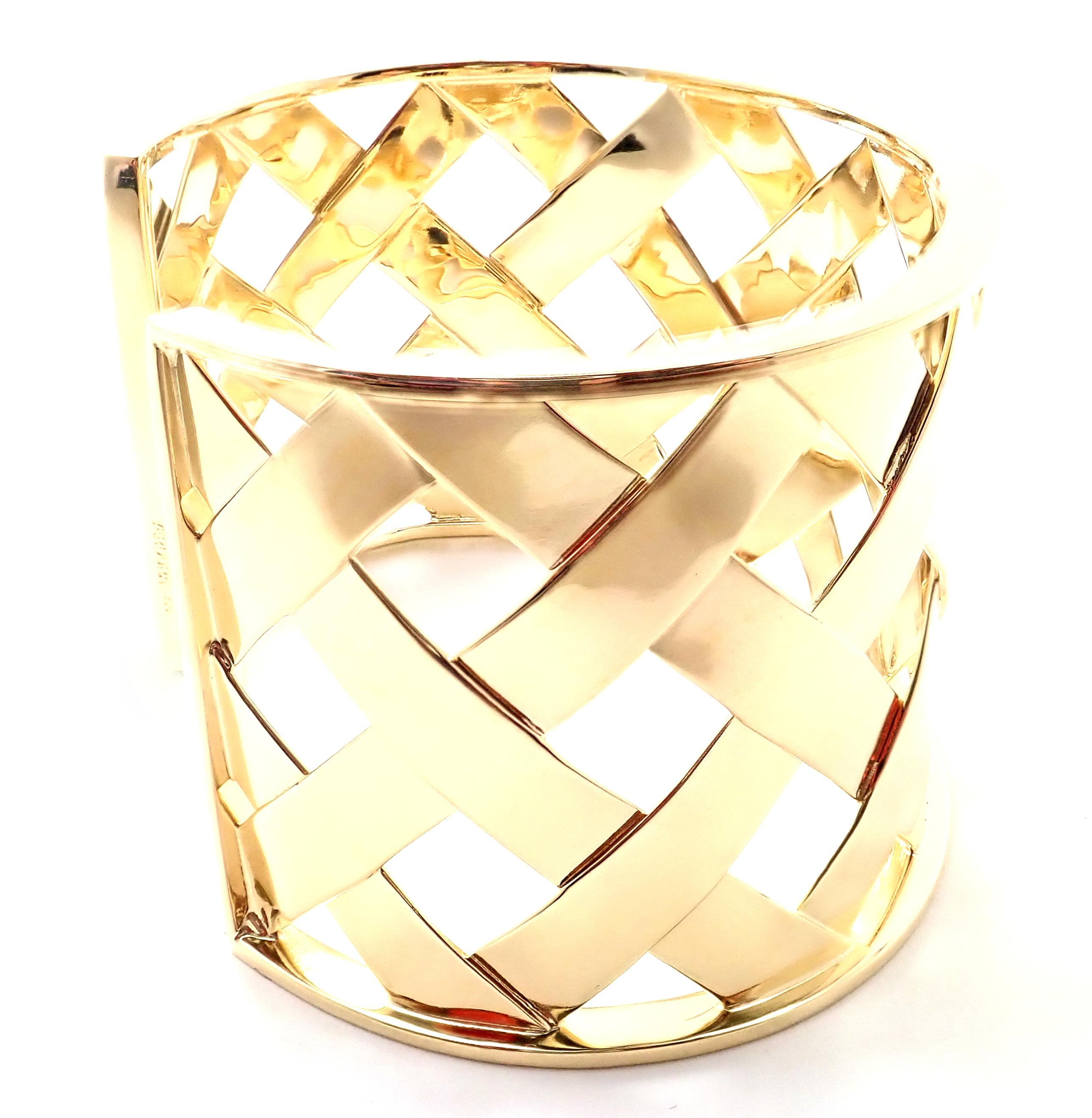 18k Yellow Gold Criss Cross Wide Cuff Bangle Bracelet by Verdura. 
Details: 
Weight: 64.3 grams
Width: 1.5