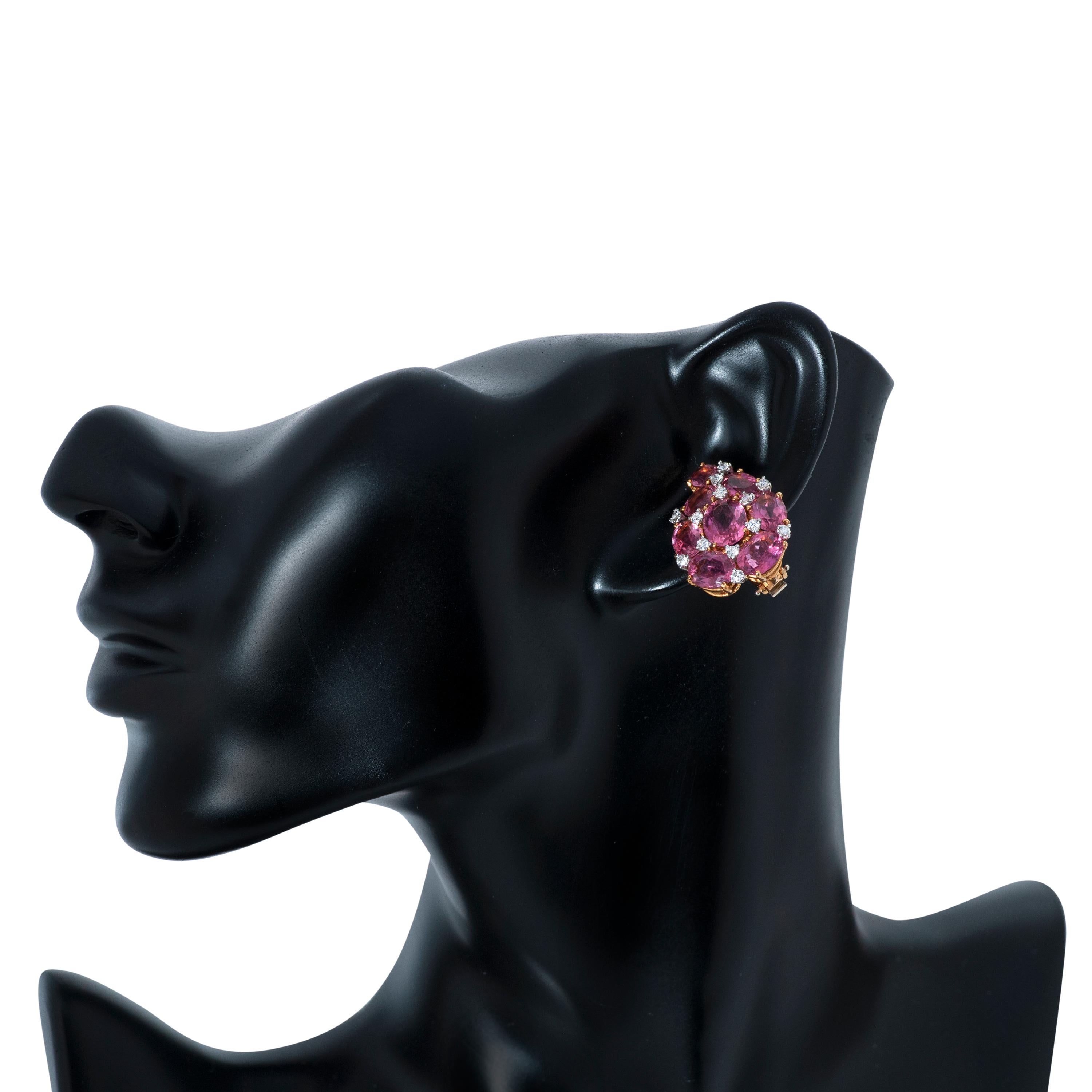 Verdura diamond and pink tourmaline Paisley ear clips in 18k yellow gold and platinum.

These earrings feature 16 oval pink tourmalines totaling approximately 20.00 carats, as well as 26 round brilliant cut diamonds totaling approximately 1.00 cart