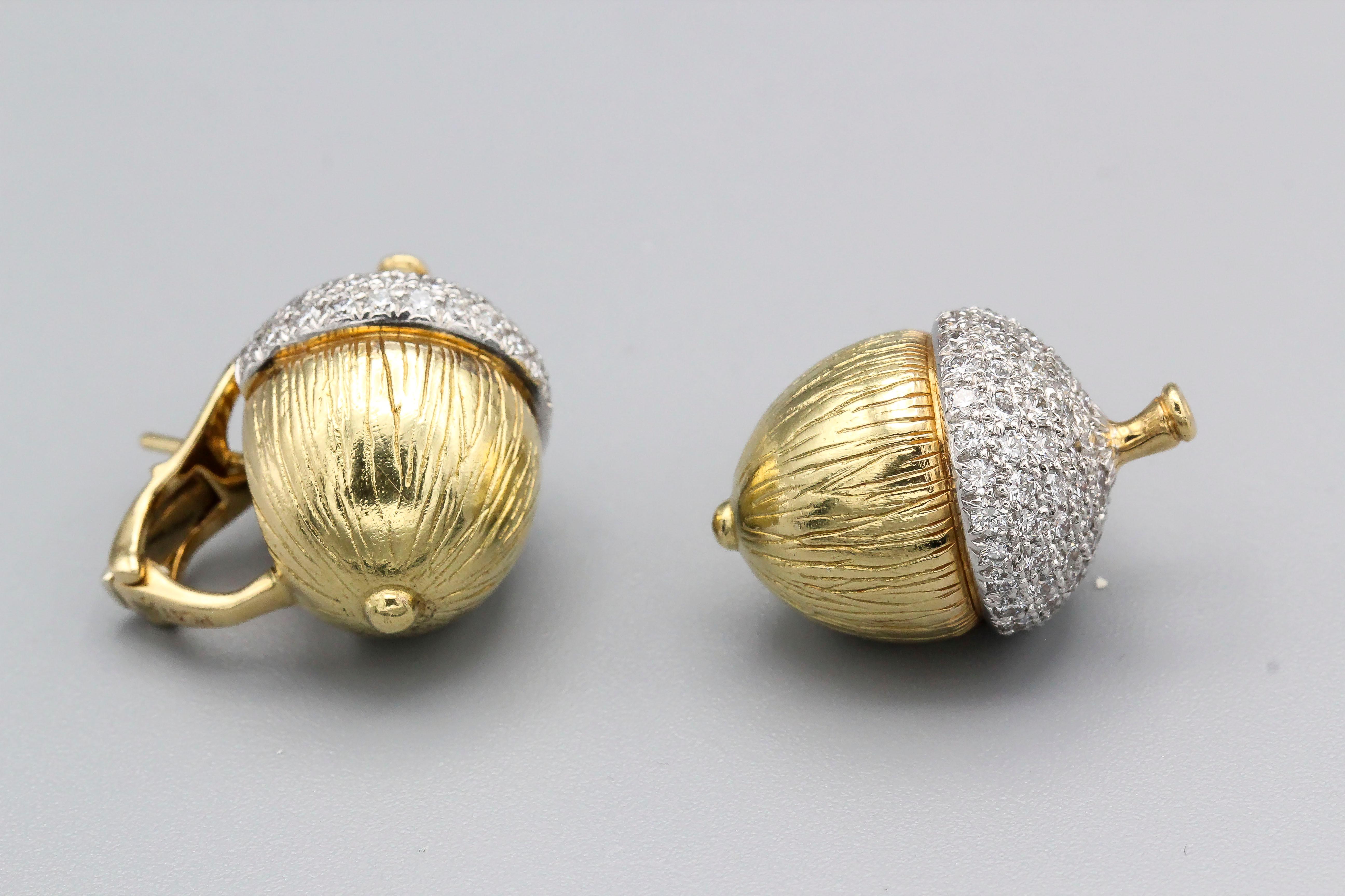 Fine pair of diamond, platinum and 18K yellow gold earrings by Verdura. Resembling acorns, they are adorned with high grade round brilliant cut diamonds over a very detailed gold and platinum setting. Current retail price $23500.

Hallmarks: