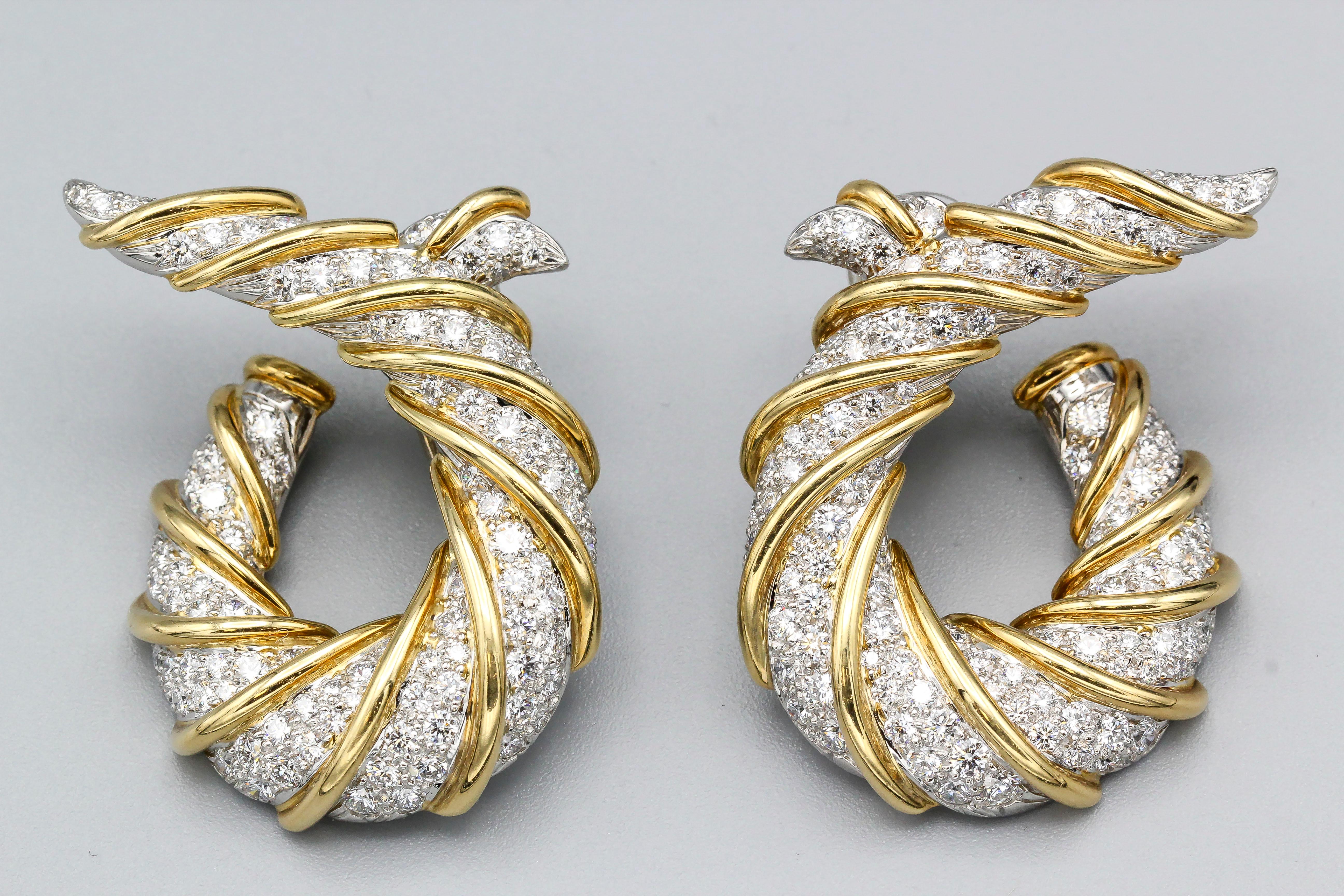 Rare elegant platinum, diamond and 18K yellow gold earclips from the 
