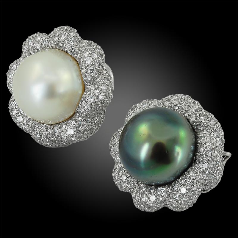 A pair of diamond,  white & grayish South sea pearl earrings, signed Verdura.
Circa 1990s
Pearl approx. 15mm and diamond weight approx. 5 cts.