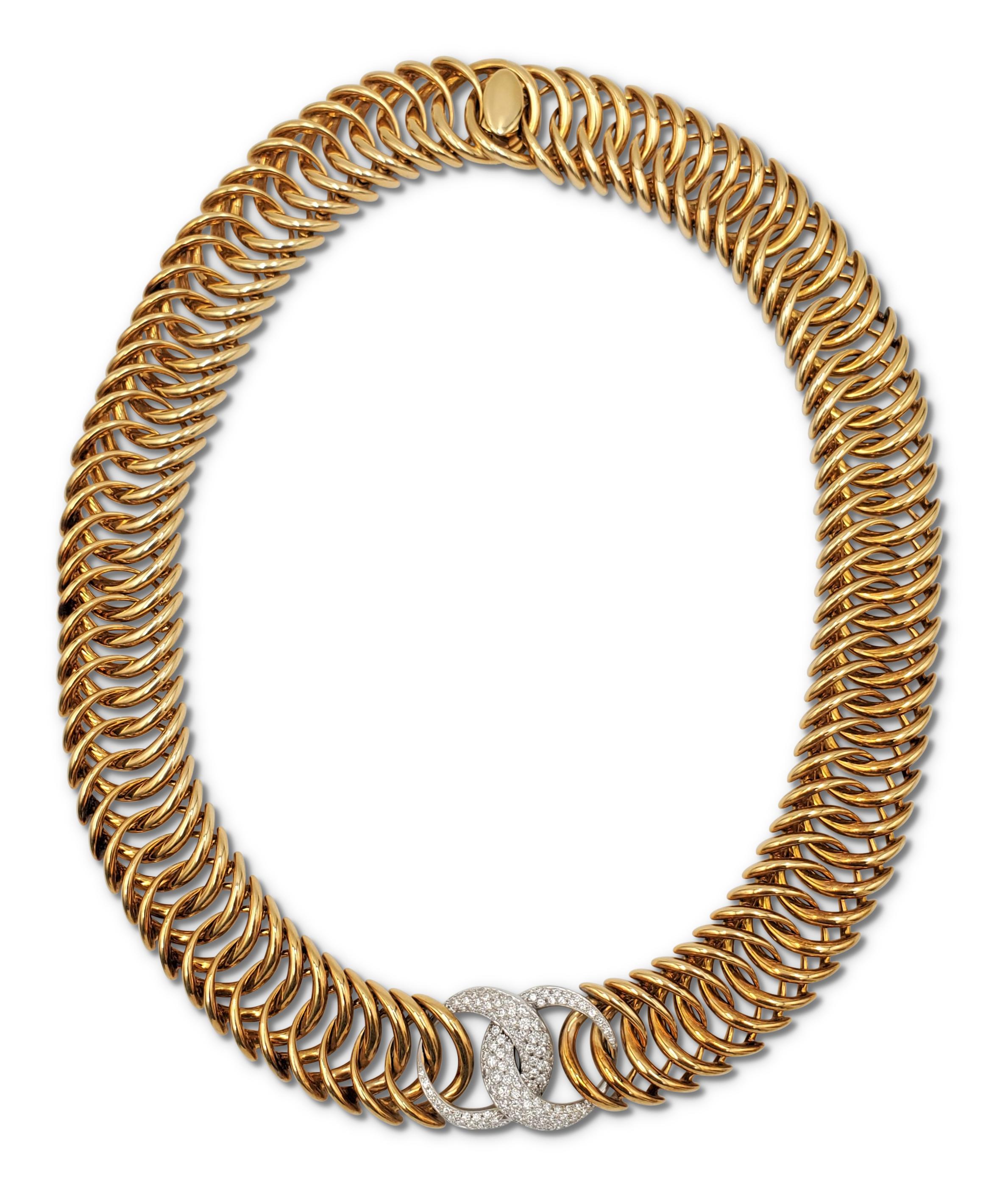 Verdura 'Double Crescent' necklace centers on two interlocking crescent-shaped links set with an estimated 2.01 carats of high quality round brilliant cut diamonds (E-F color, VS) set in white gold, connecting with polished 18 karat yellow gold