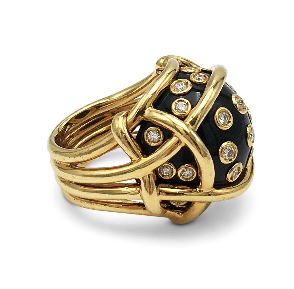 Authentic whimsical Verdura polka dot ring crafted in 18 karat yellow gold and black jade. The jade is set with an estimated 0.80 carats of high-quality (E-F, VS) round brilliant cut diamonds. Signed Verdura, 750. Ring size 5 1/2. Not presented with