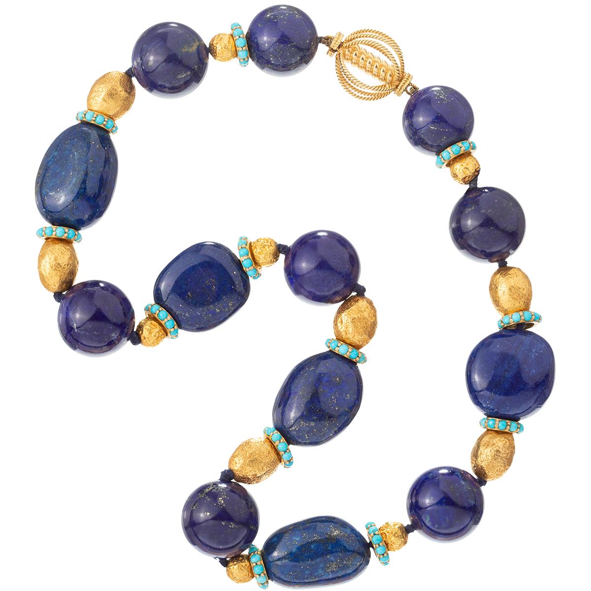 Bead necklace, featuring lapis beads alternating with 18k yellow gold beads and gold rondelles studded around the exterior with cabochon turquoise, secured by an 18k yellow gold open cage-style ball clasp.  Clasp signed 'VERDURA'.  19