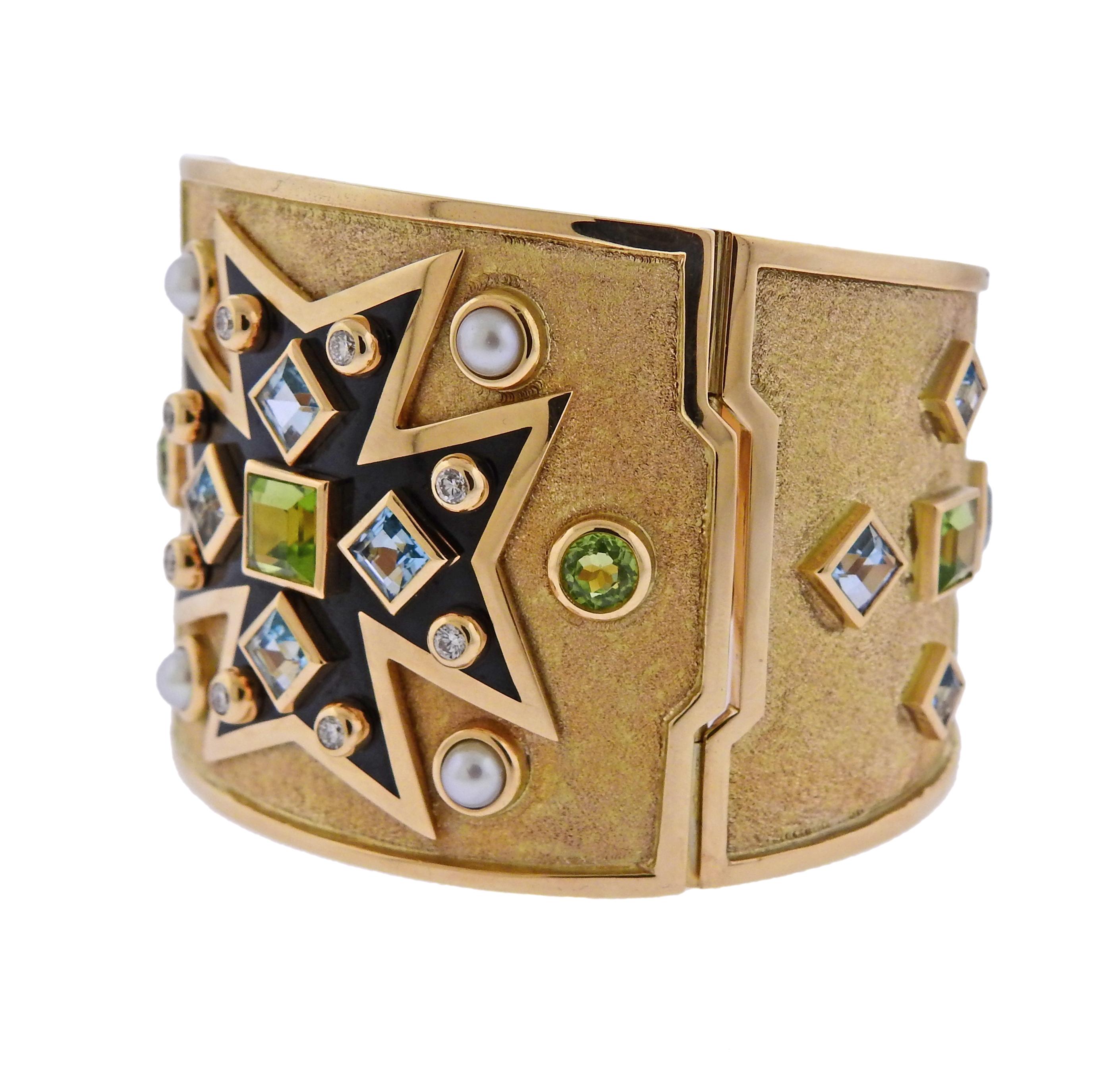 Iconic Maltese Cross bracelet, crafted by Verdura, set with multi color gemstones, pearls and approx. 0.40ctw in G/VS diamonds.  Bracelet will fit approx. 7