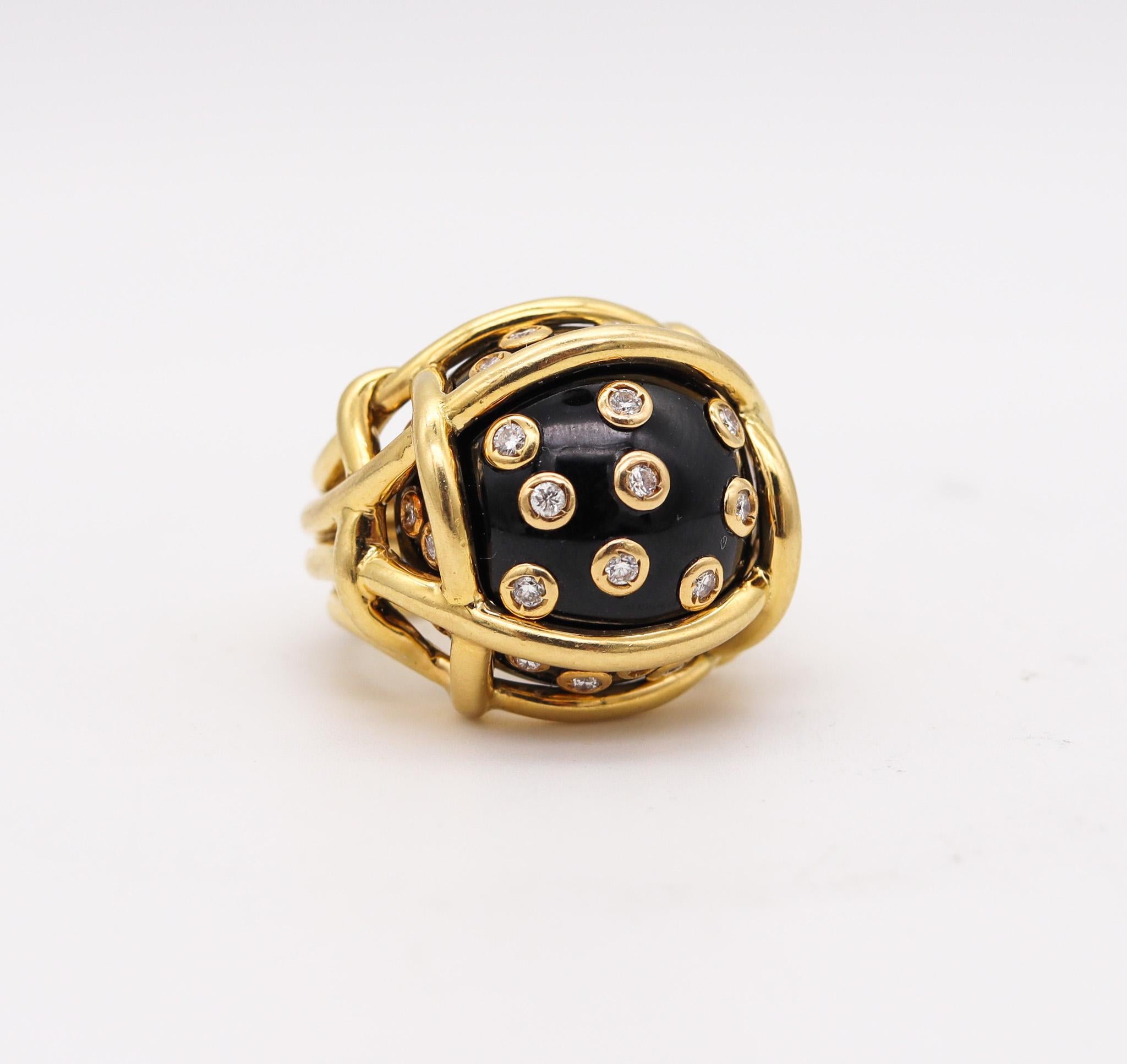 Polka dots cocktail Ring designed by Verdura.

Beautiful and iconic polka dot ring, created in Milano Italy by the jewelry house of Verdura. This cocktail ring has been crafted in the shape of a wired nest in solid yellow gold of 18 karats with high