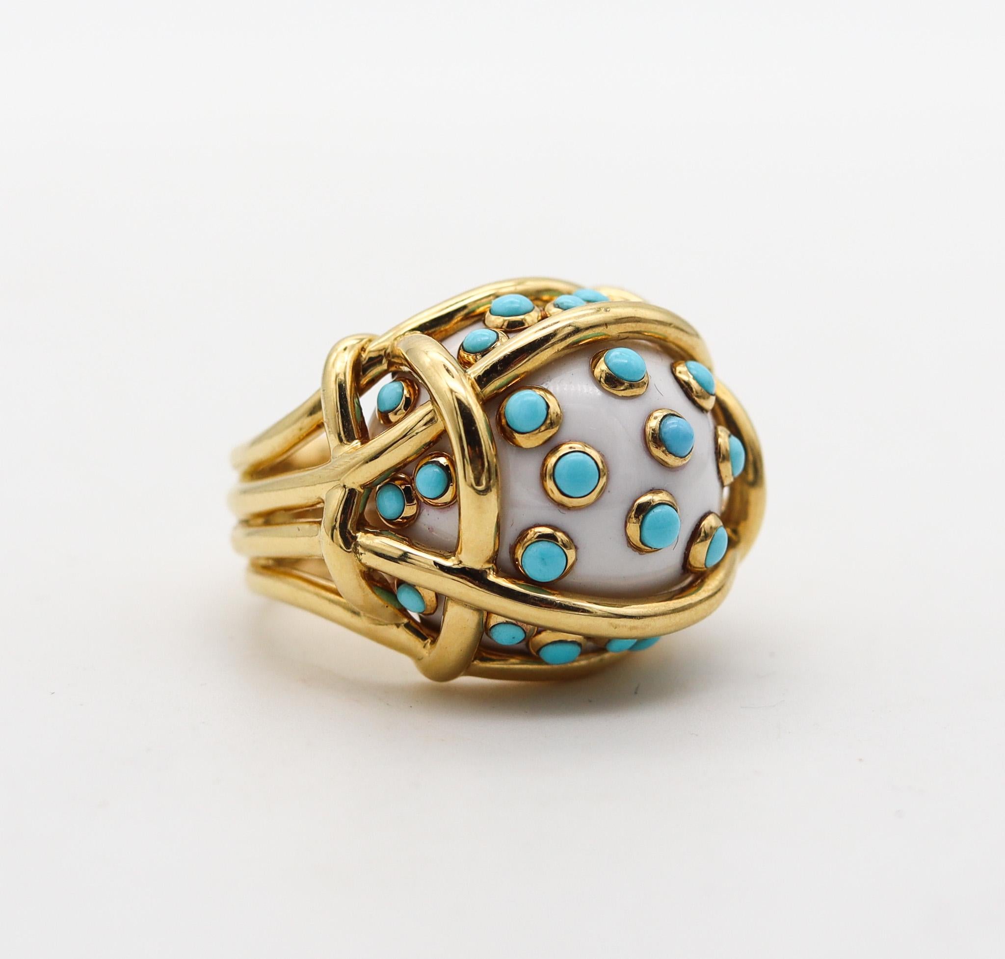 Polka dots cocktail Ring designed by Verdura.

Beautiful and colorful polka dot cocktail ring, created in Milano Italy by the jewelry house of Verdura. This iconic cocktail ring has been crafted in the shape of a wired nest in solid yellow gold of