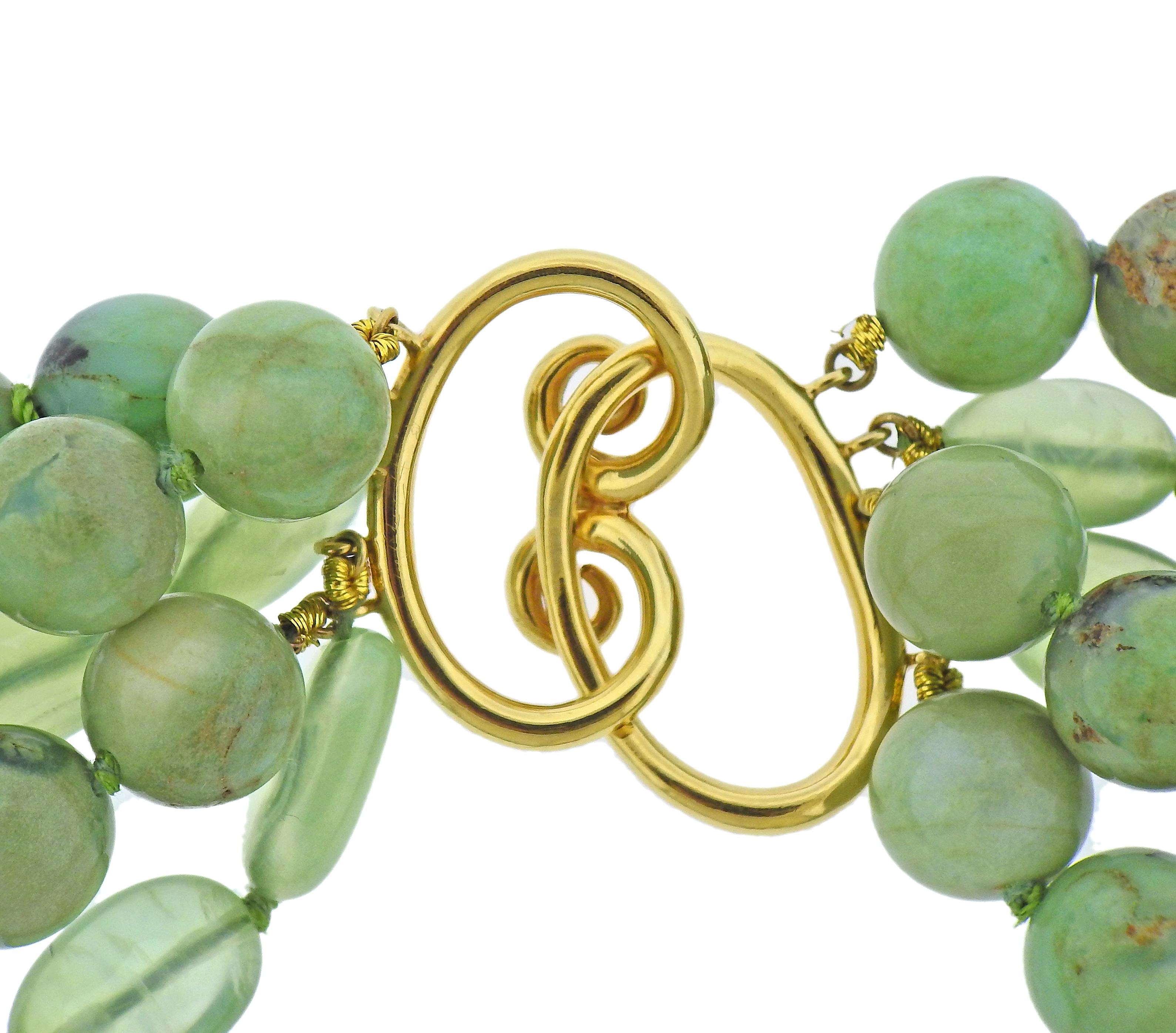 18k gold torsade necklace by Verdura, with green gemstones, pearls, citrines and tsavorites. Necklace is 18