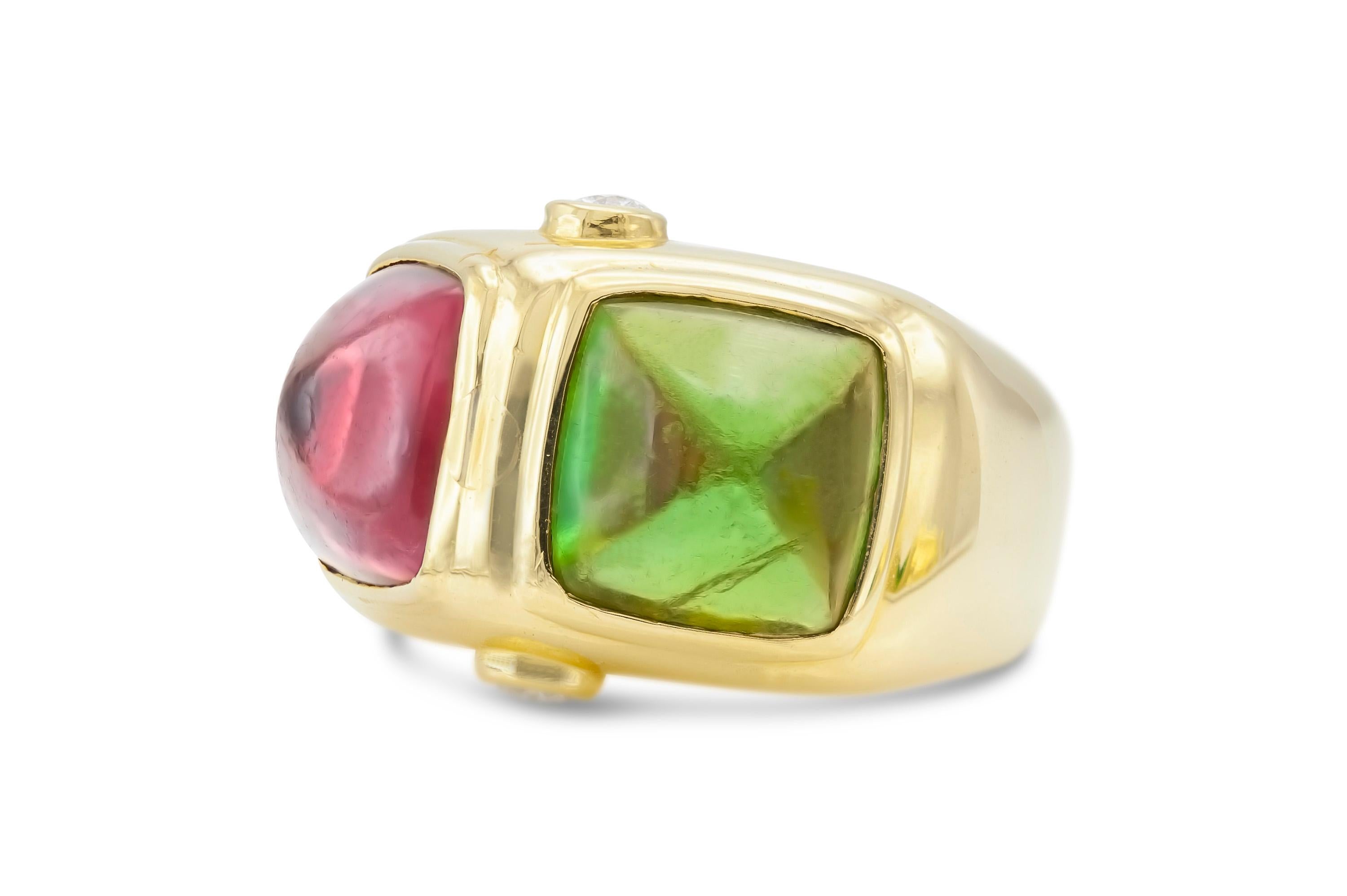 Finely crafted in 18k yellow gold with Red and Green Sugarloaf Tourmalines.
The ring features two round brilliant cut diamonds.
Swiss made
Size 7 3/4