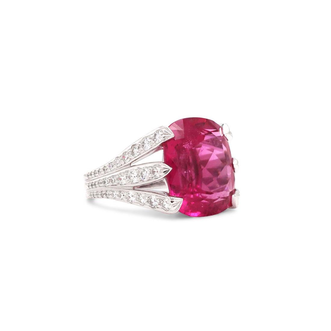 Authentic Verdura Six Blades ring crafted in platinum is set with a cushion cut hot pink Rubellite weighing an estimated 14.25ct. This ring is comprised of 6 prongs set with round brilliant cut diamonds with an estimated 1.25 total carat weight.