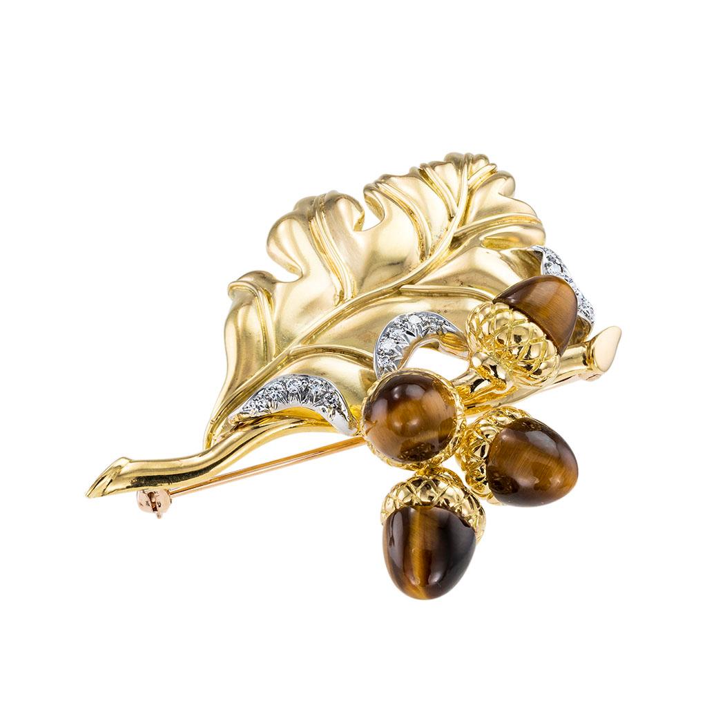 Verdura tiger eye and yellow gold oak leaf brooch circa 1980.  

Contact us right away if you have additional questions.  We are here to connect you with beautiful and affordable antique and estate jewelry.

SPECIFICATIONS:

GEMSTONES:  four