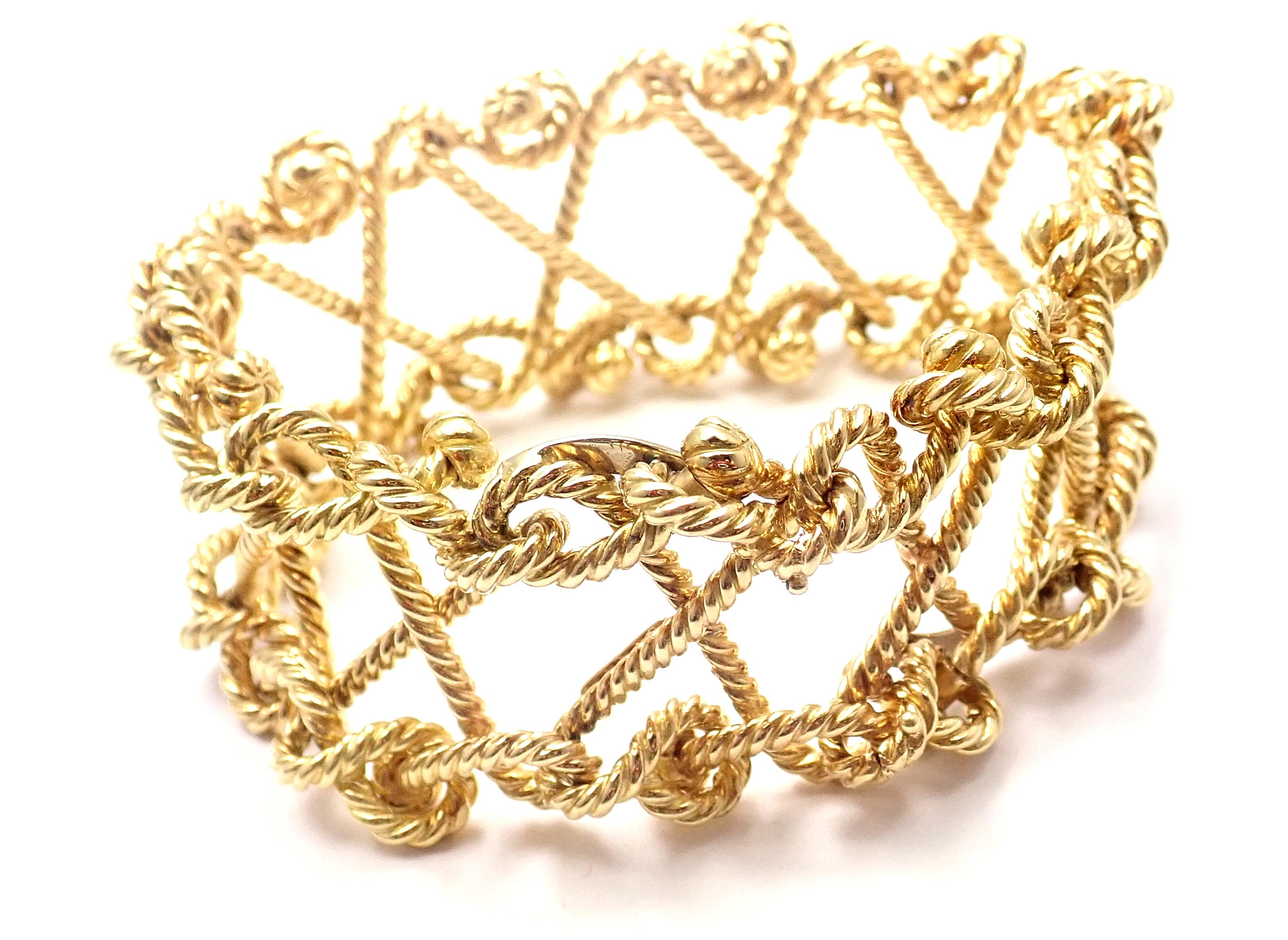 18k Yellow Gold Twisted Rope Openwork Wide Link Bracelet by Verdura. 
Details: 
Weight: 105.9 grams
Width: 1 1/4