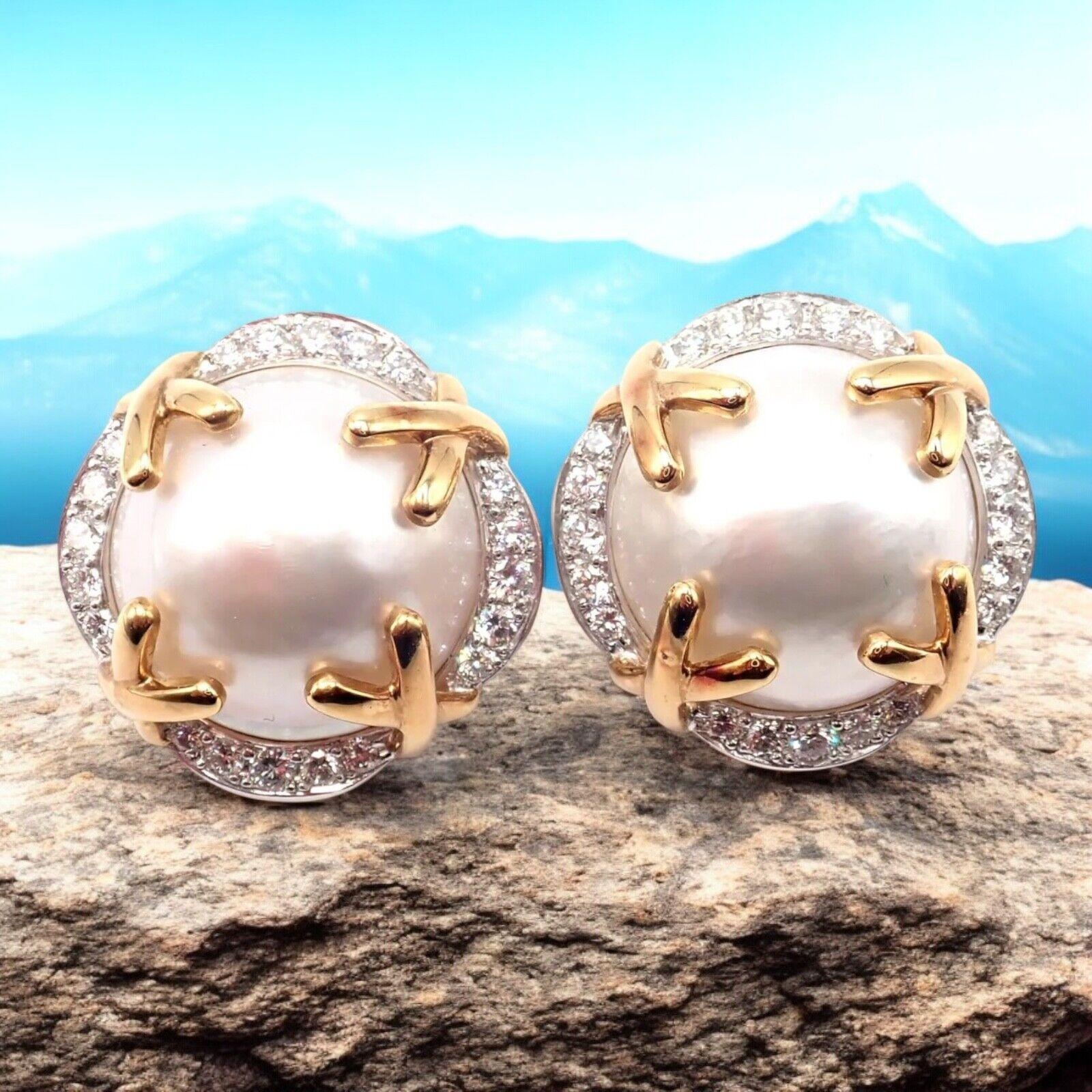 18k Yellow Gold and Platinum Vintage Diamond Mabe Pearl Large Earrings by Verdura. 
Behold the timeless sophistication of these Authentic! Vintage Verdura 18k Yellow Gold Mabe Pearl Diamond Large Earrings. 
An opulent silhouette pairs luminous Mabe