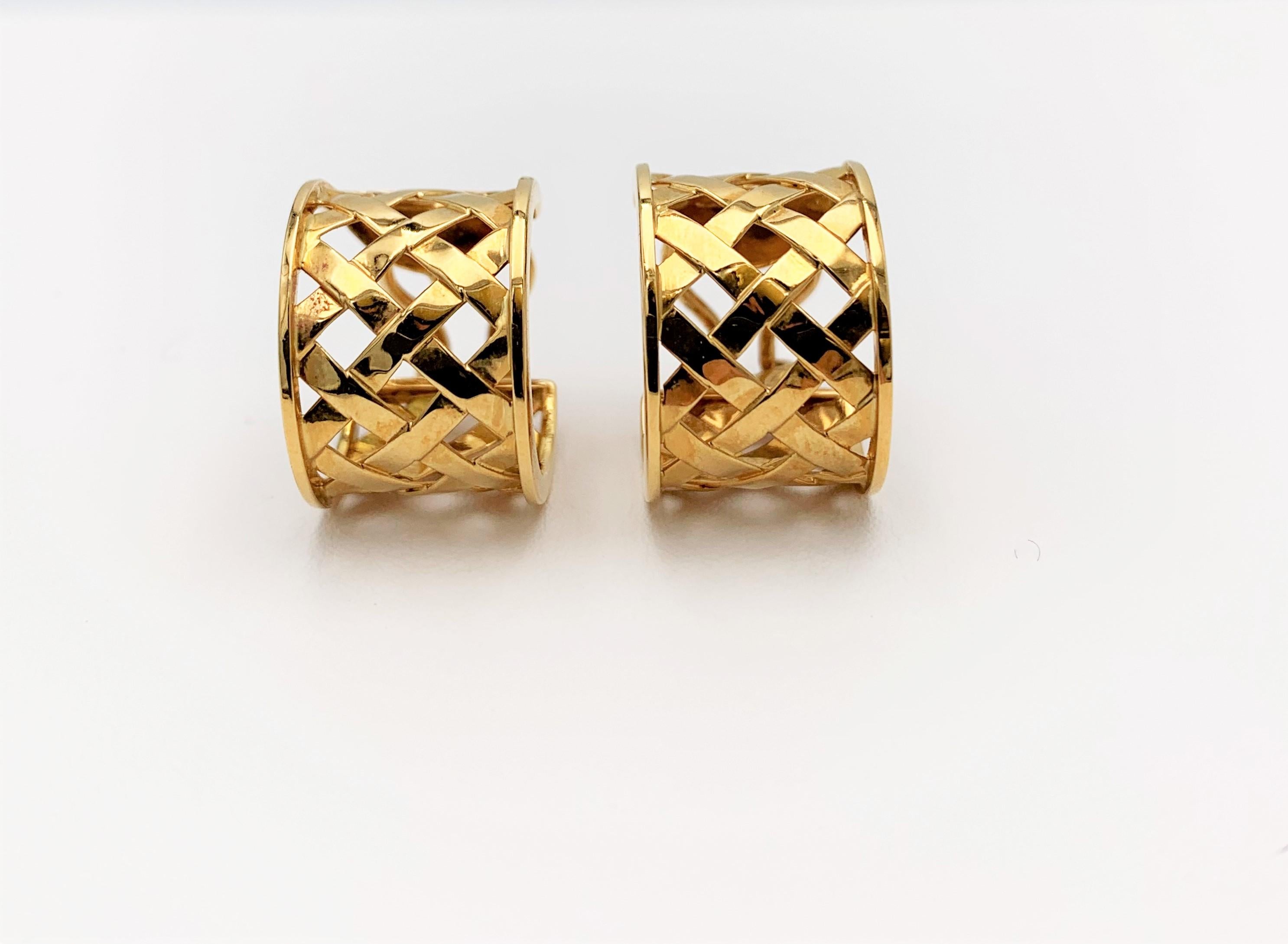 Authentic Verdura 'Criss Cross' earrings crafted in 18 karat yellow gold. Signed Verdura, 750. Clip backs with posts. Not presented with original box and/or papers. CIRCA 2000s.