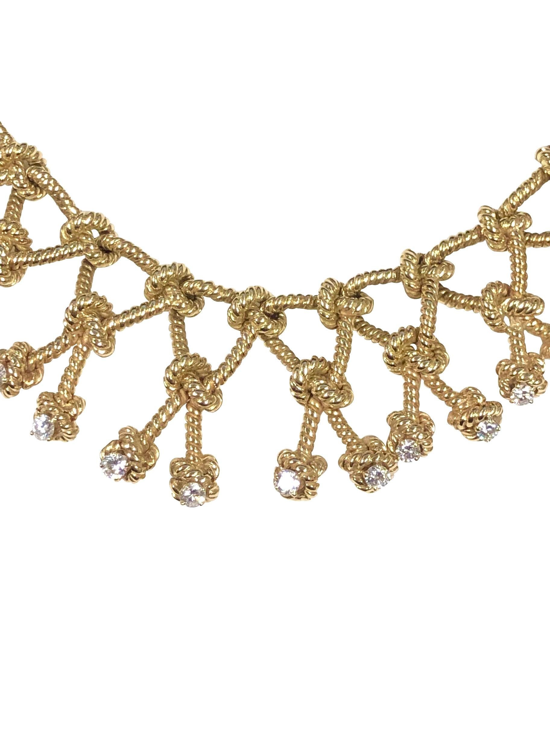 Circa 1970s Verdura 14K Yellow Gold Twisted Rope Fringe Necklace, measuring 15 1/4 inch in length 1 1/4 inch wide tapering down to 1/2 inch and weighing 149 Grams. Set with 25 Round Brilliant cut Diamonds totaling 2.50 Carats. 