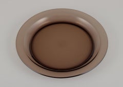 Vereco, France. Set of four dinner plates in smoked art glass. 1970s.