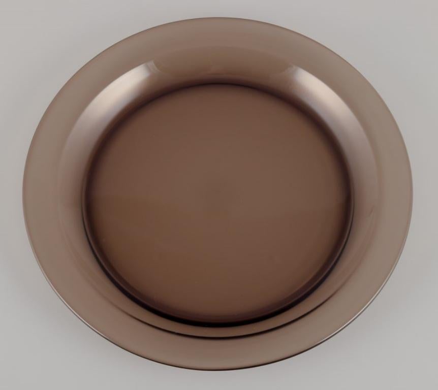 French Vereco, France. Set of four dinner plates in smoked art glass. 1970s. For Sale