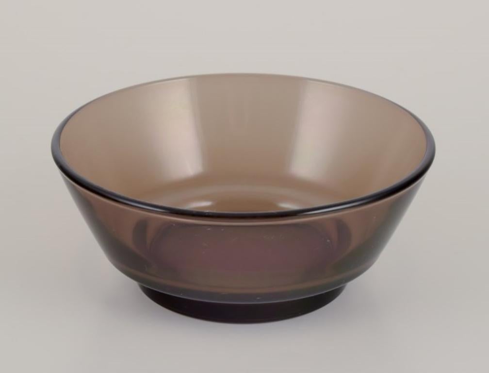 Vereco, France. A set of six bowls in smoked art glass.
1970s.
Marked.
Perfect condition.
Dimensions: D 12.0 cm x H 4.9 cm.
