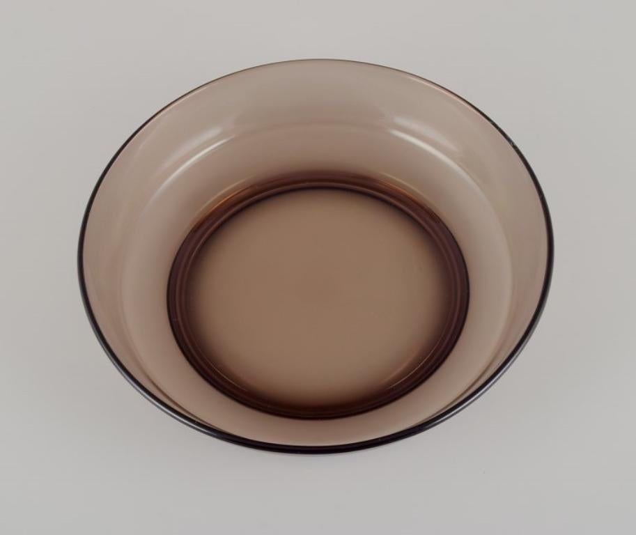Vereco, Francia. Un set di sei ciotole per zuppa in vetro artistico affumicato.
1970s.
Contrassegnato.
Condizioni perfette.
Dimensioni: D. A. 18,5 cm.