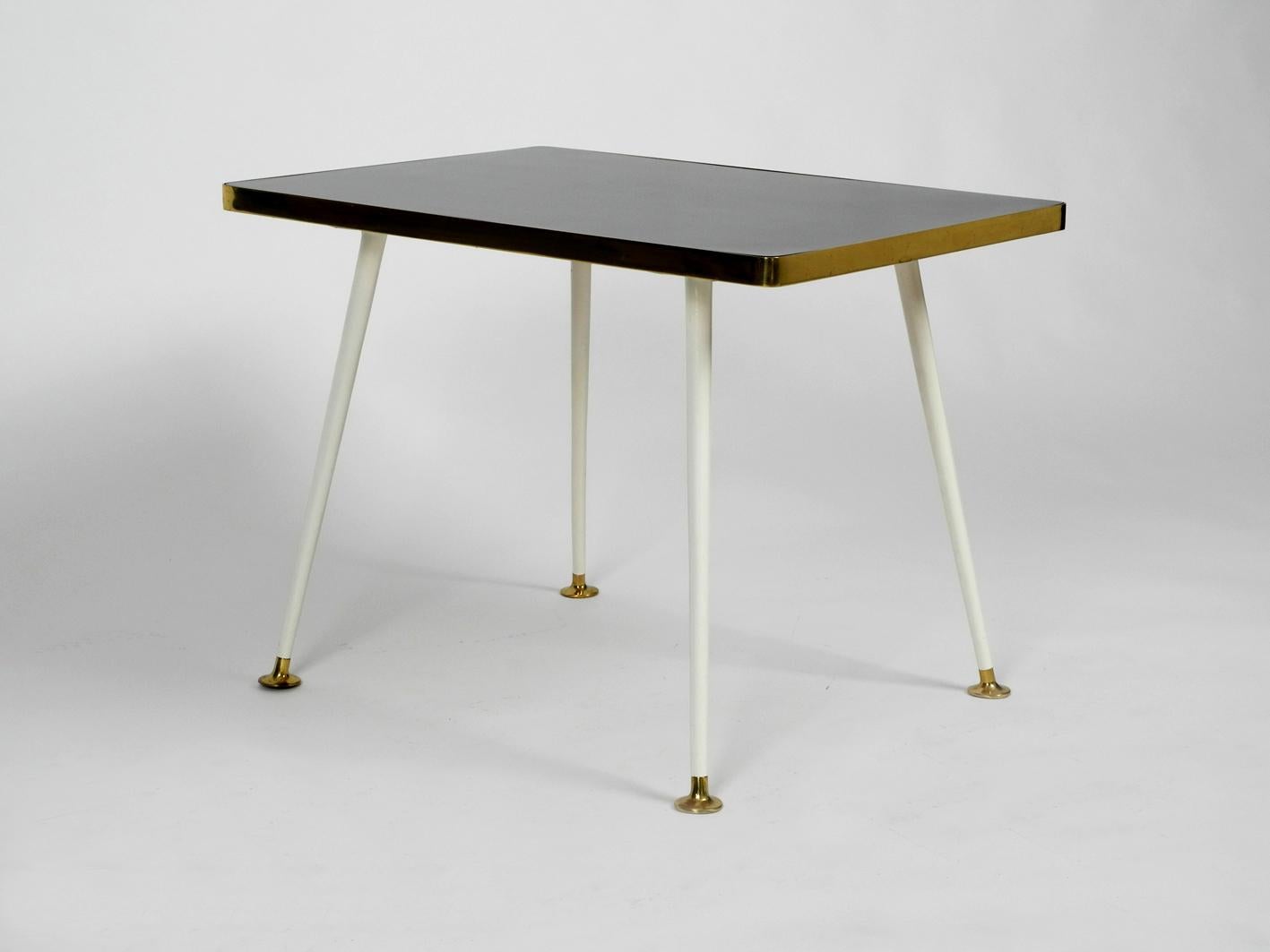 German Vereinigte Werkstätten Mid-Century Modernist Side Table Made of Wood and Metal