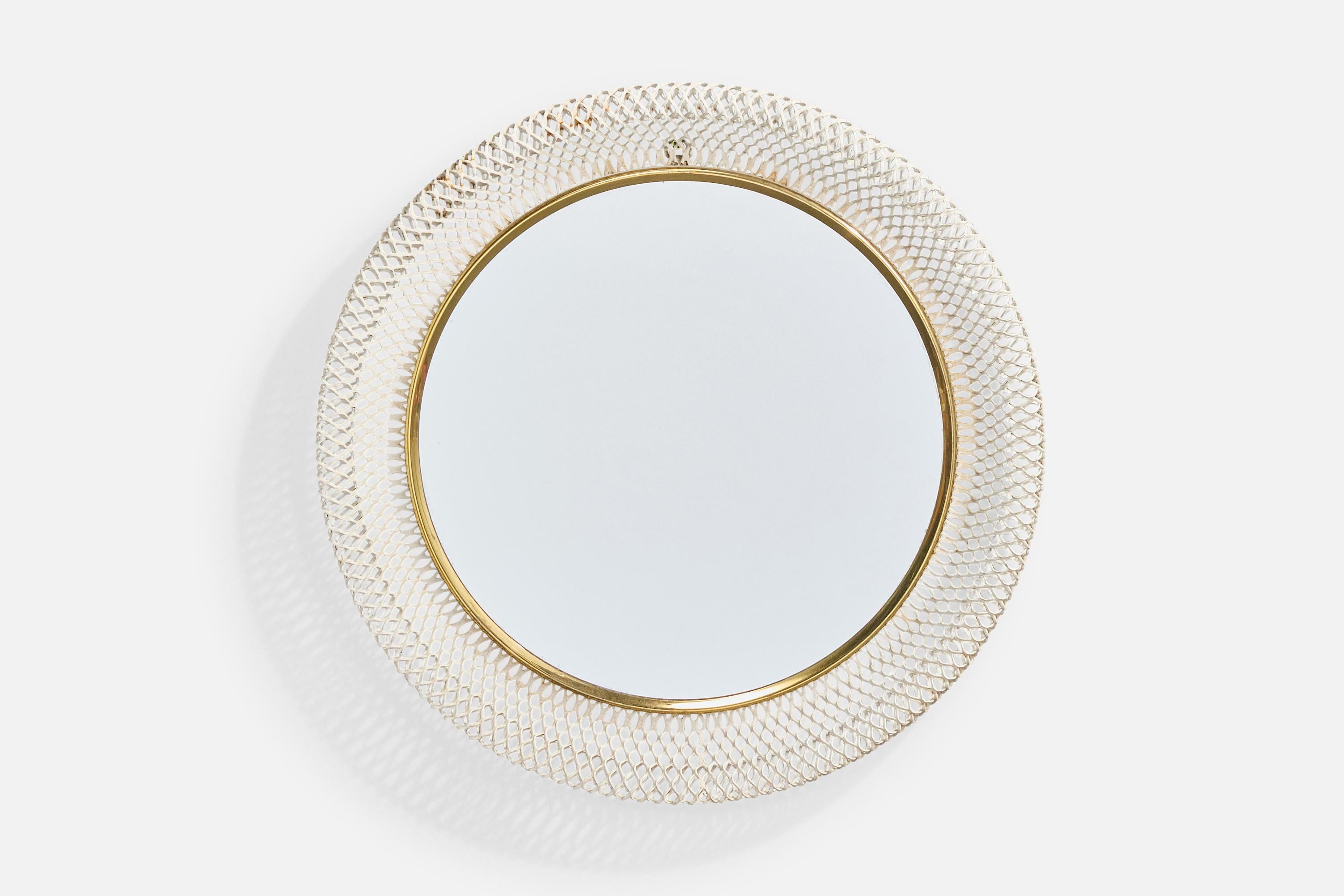 A brass and white lacquered metal wall mirror produced by Vereinigte Werkstätten, Germany, c. 1920s.

Overall Dimensions (inches): 15.75