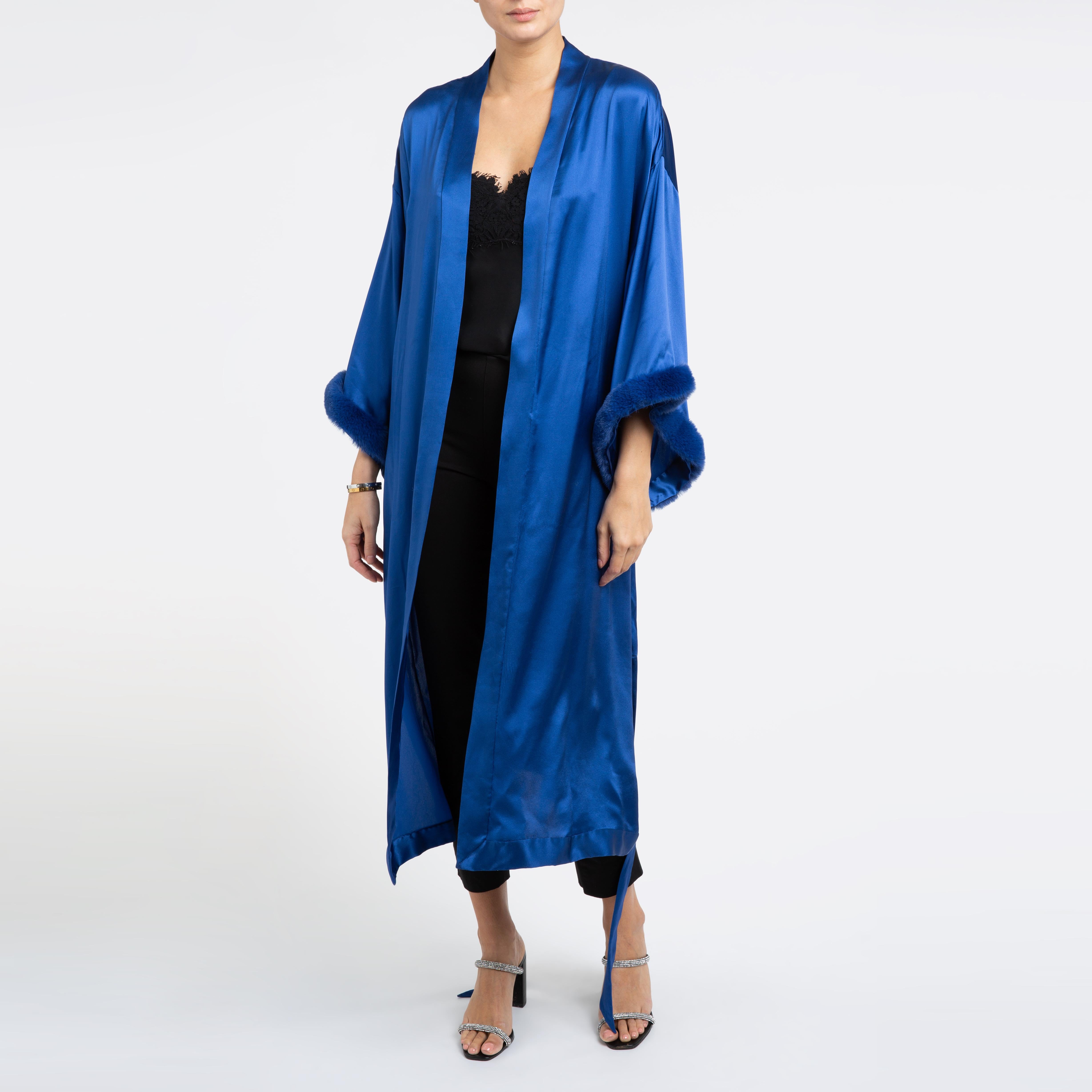 Verheyen London Blue Kimono in Italian Silk Satin with Faux Fur - Small-medium 

The Verheyen London Kimono is the perfect dress for evening wear or coat dress to wear with a pair of jeans and heels in the evening.  
Handmade in London, made with